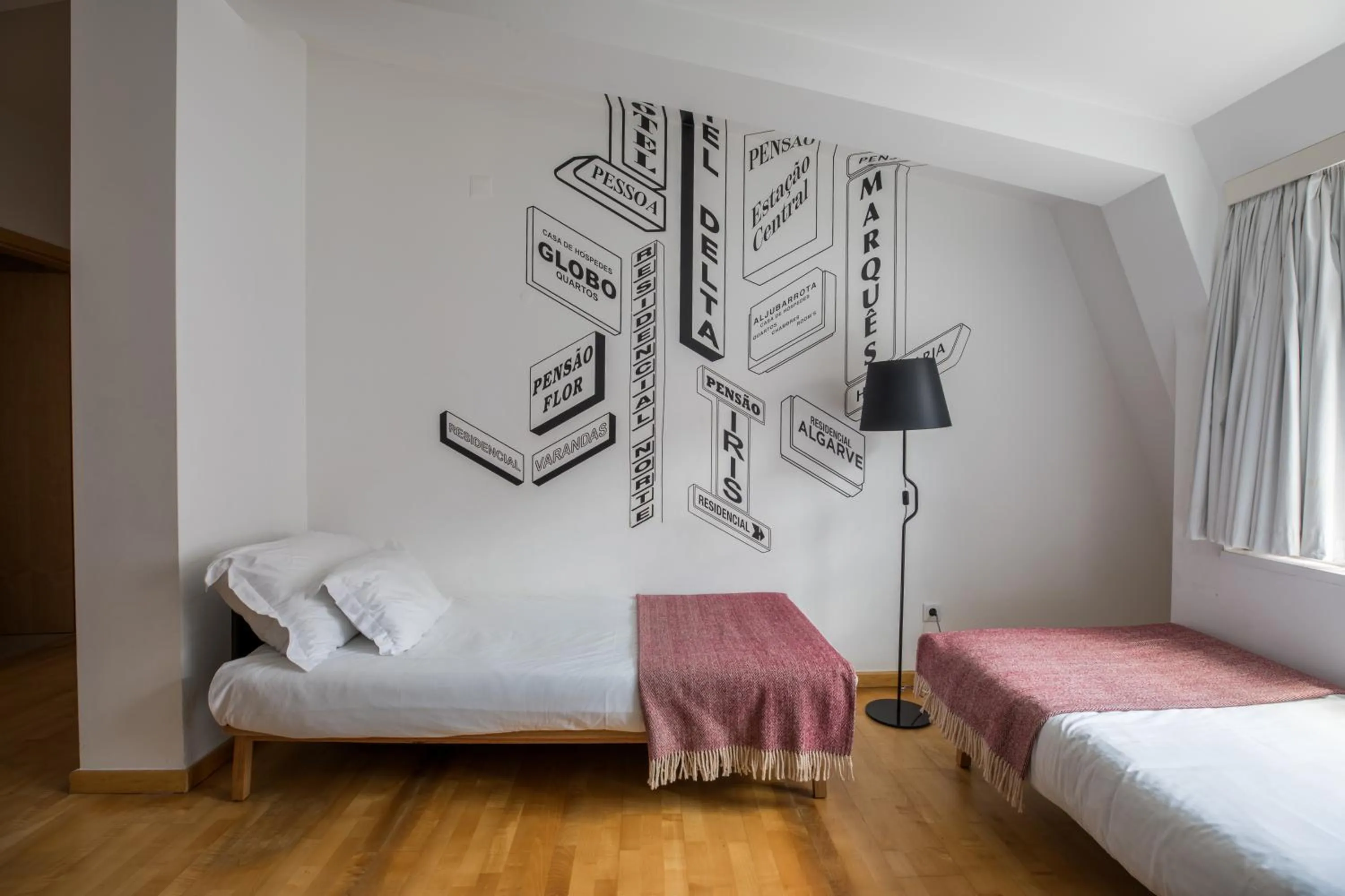 Bed in The Lisbonaire Apartments