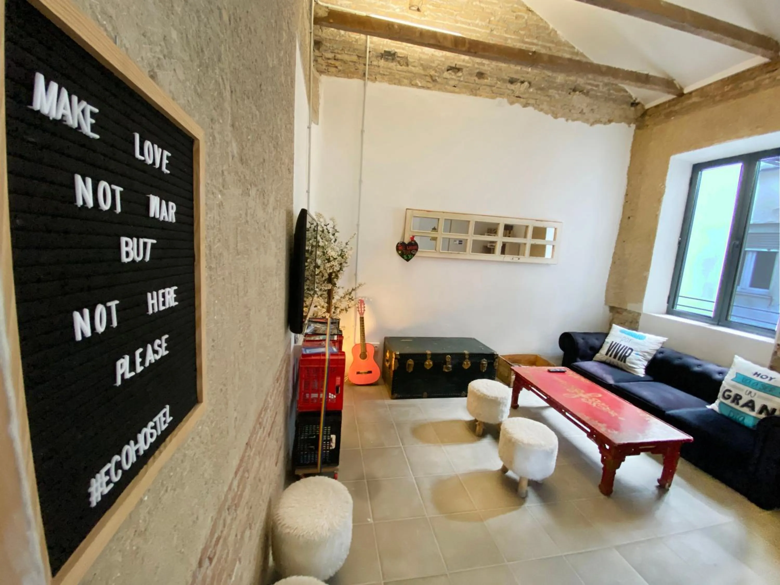 Communal lounge/ TV room in ECO Hostel