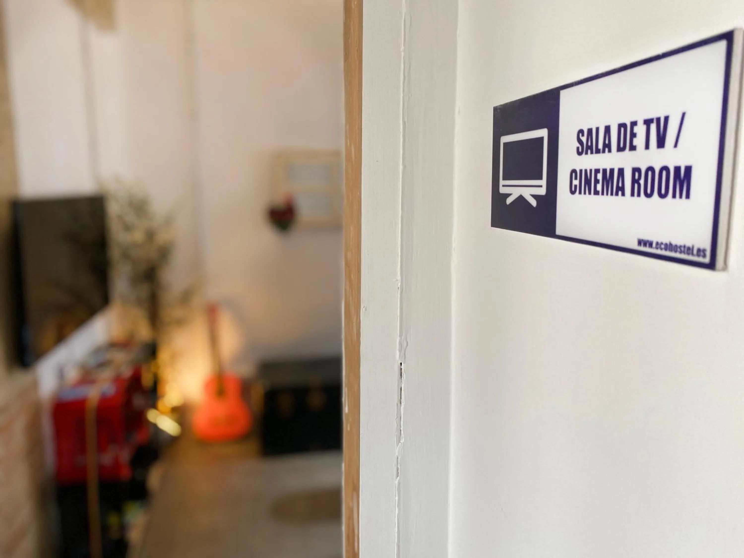 Communal lounge/ TV room in ECO Hostel