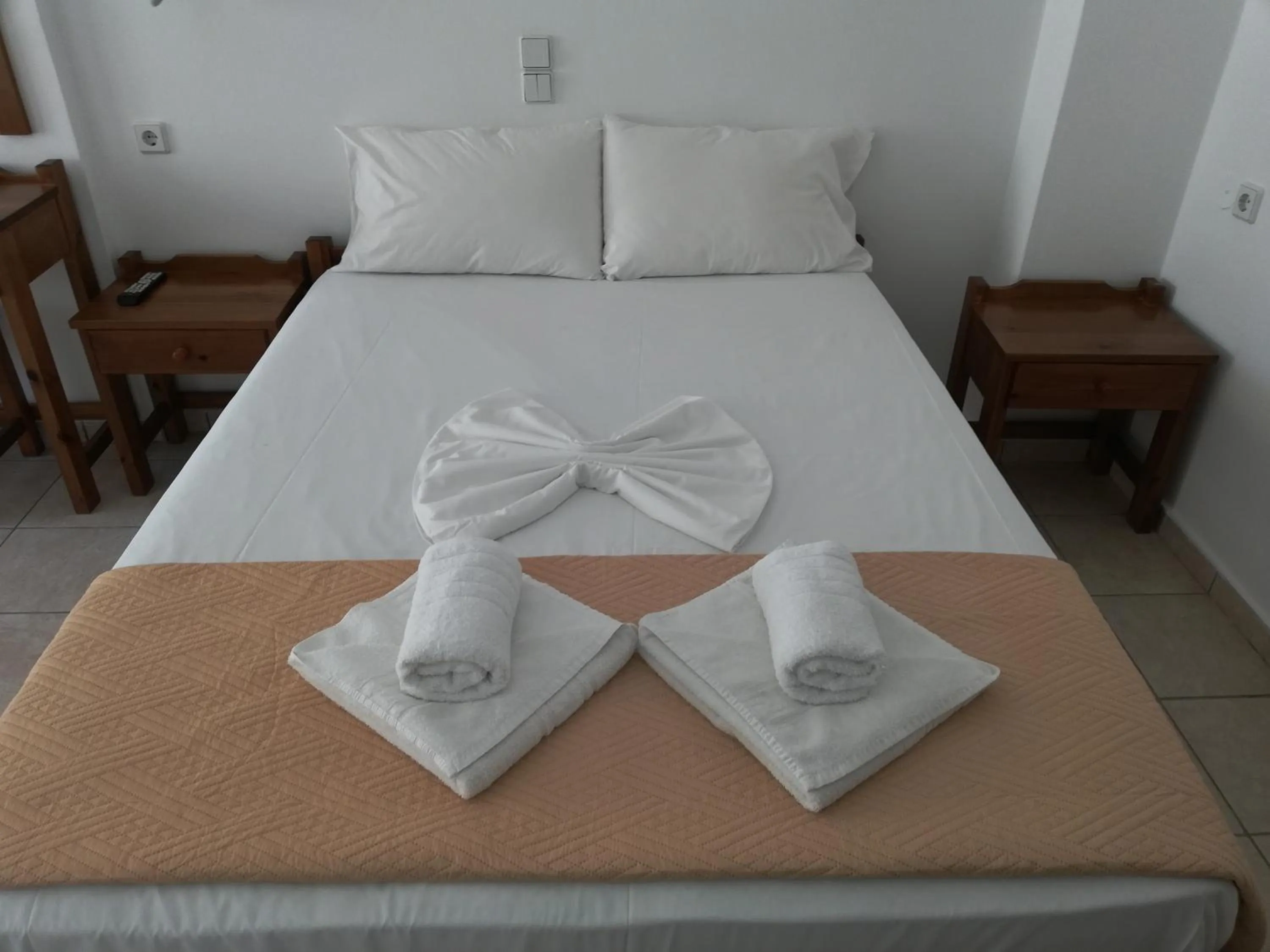 Bed in Karmi Apartments
