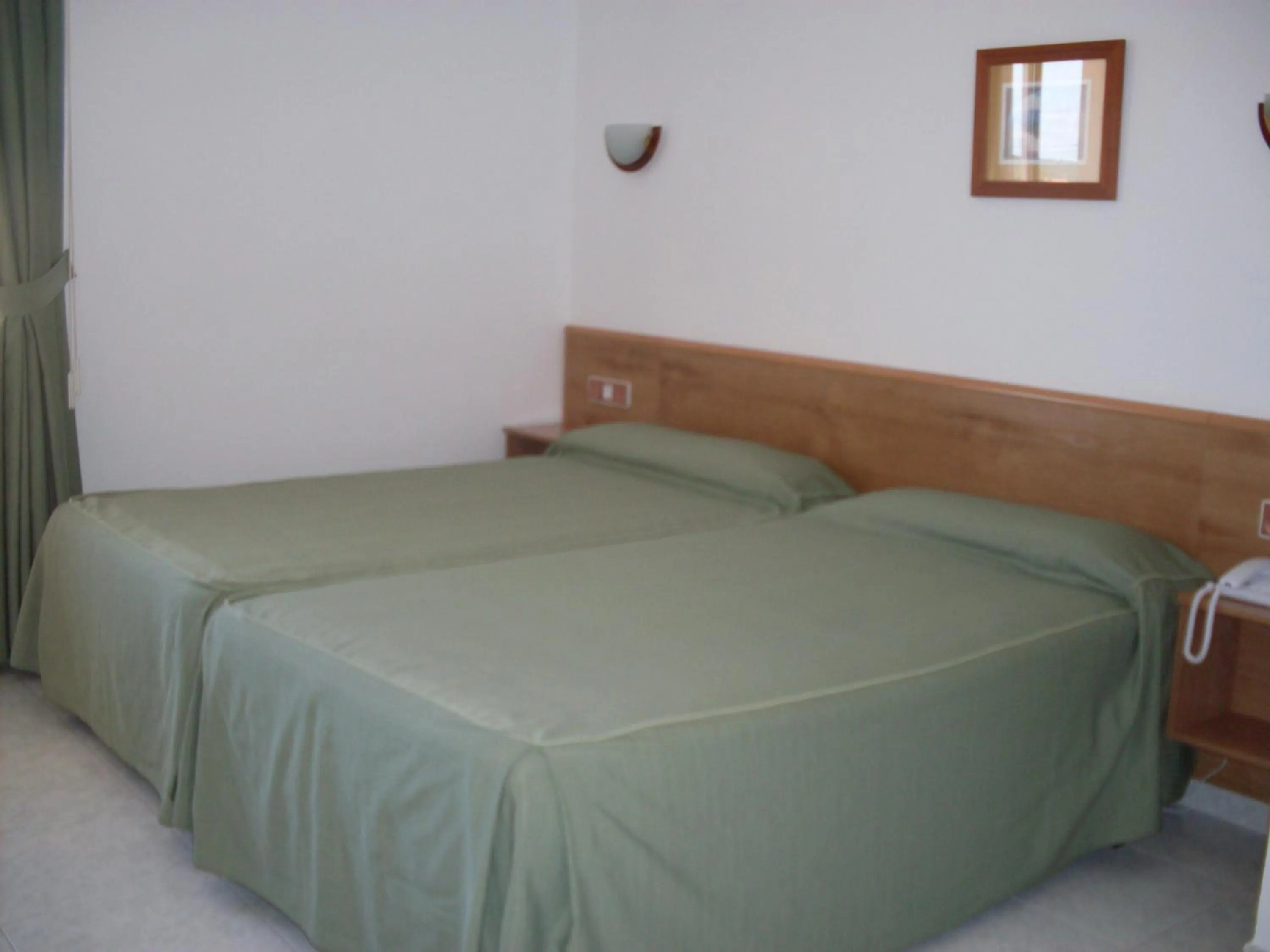 Bed in Hotel Paraimo