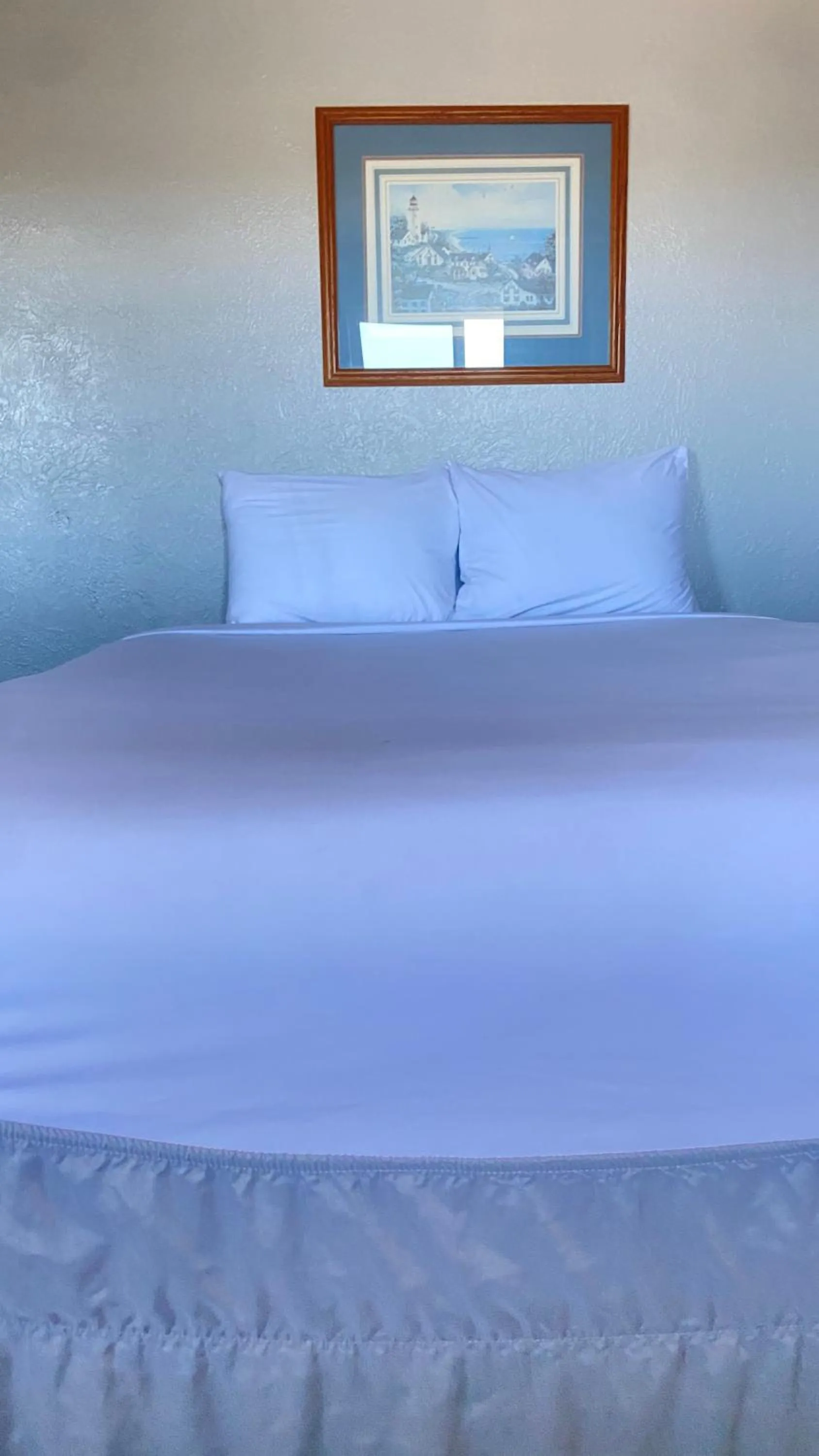 Bed in Ocean Shores Inn & Suites