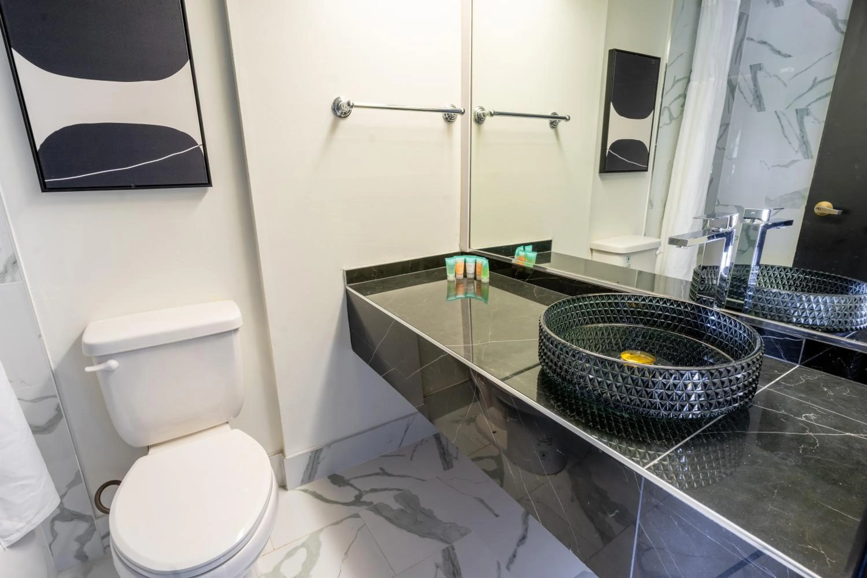 Bathroom in Sands Inn & Suites