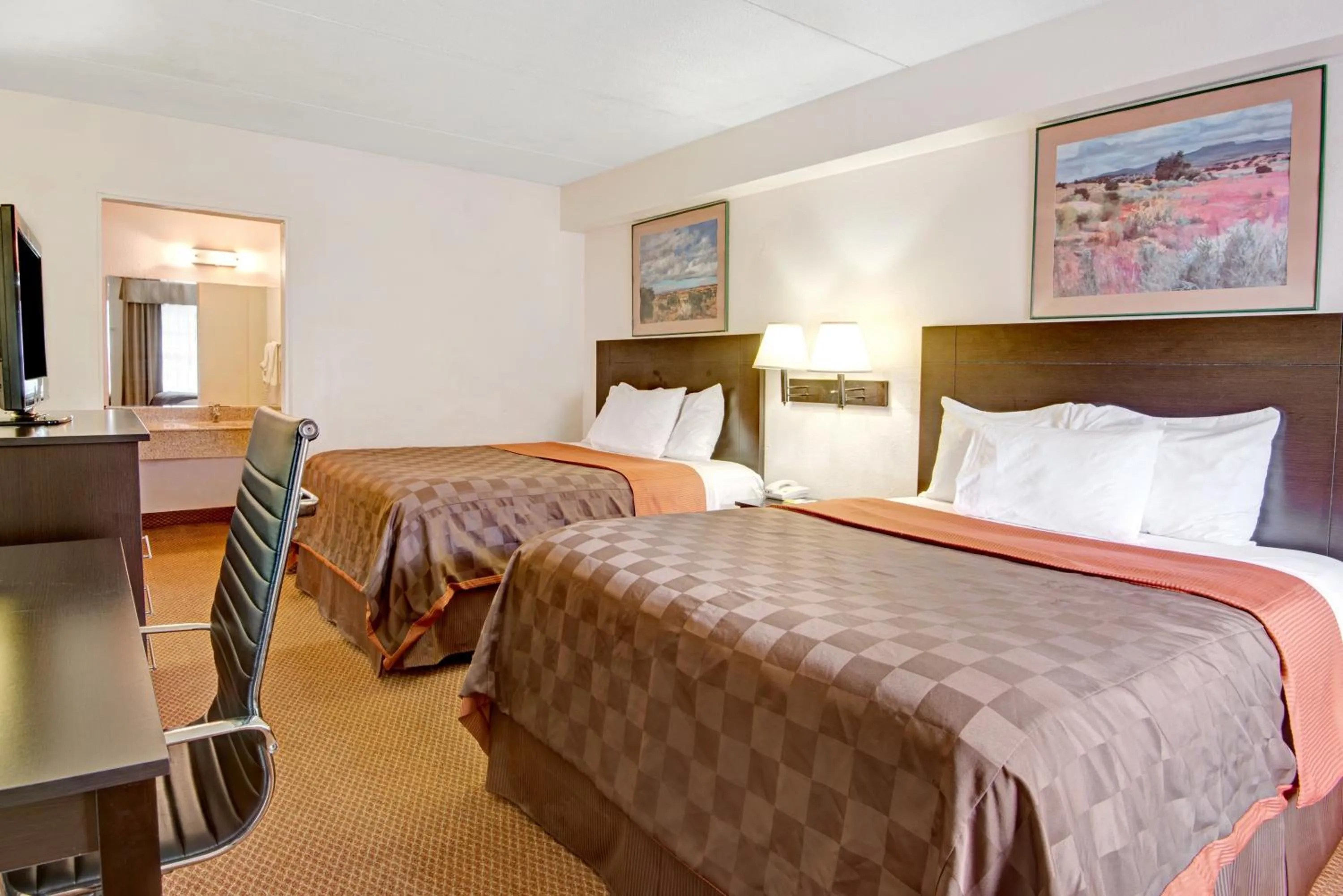 Bedroom in Deluxe Inn San Antonio Near Lackland AFB