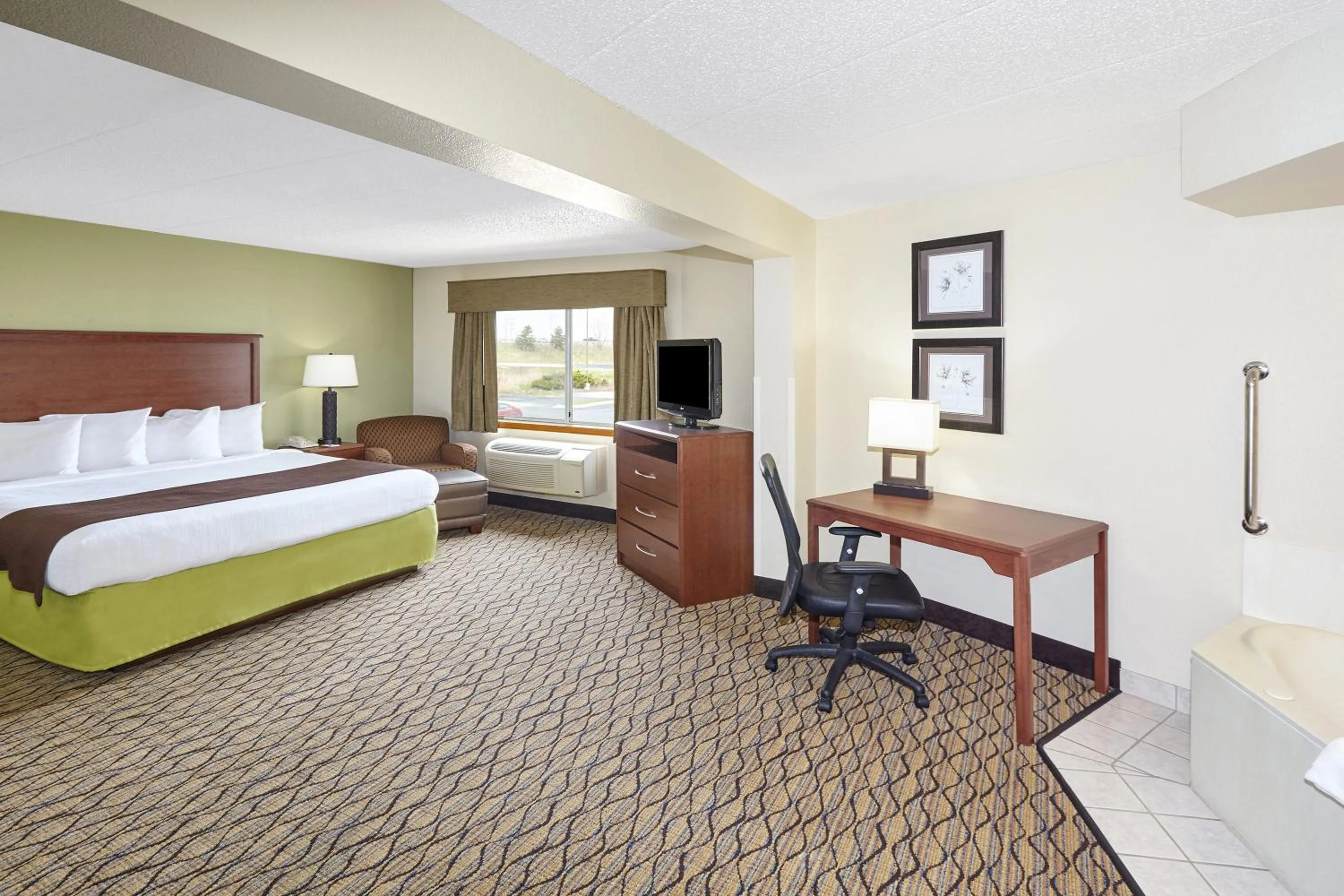 Photo of the whole room, Bed in AmericInn by Wyndham Sheboygan