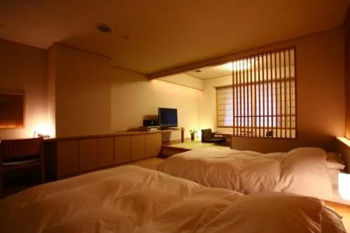 Bedroom, Bed in Suizantei Club Jozankei-Adults Only