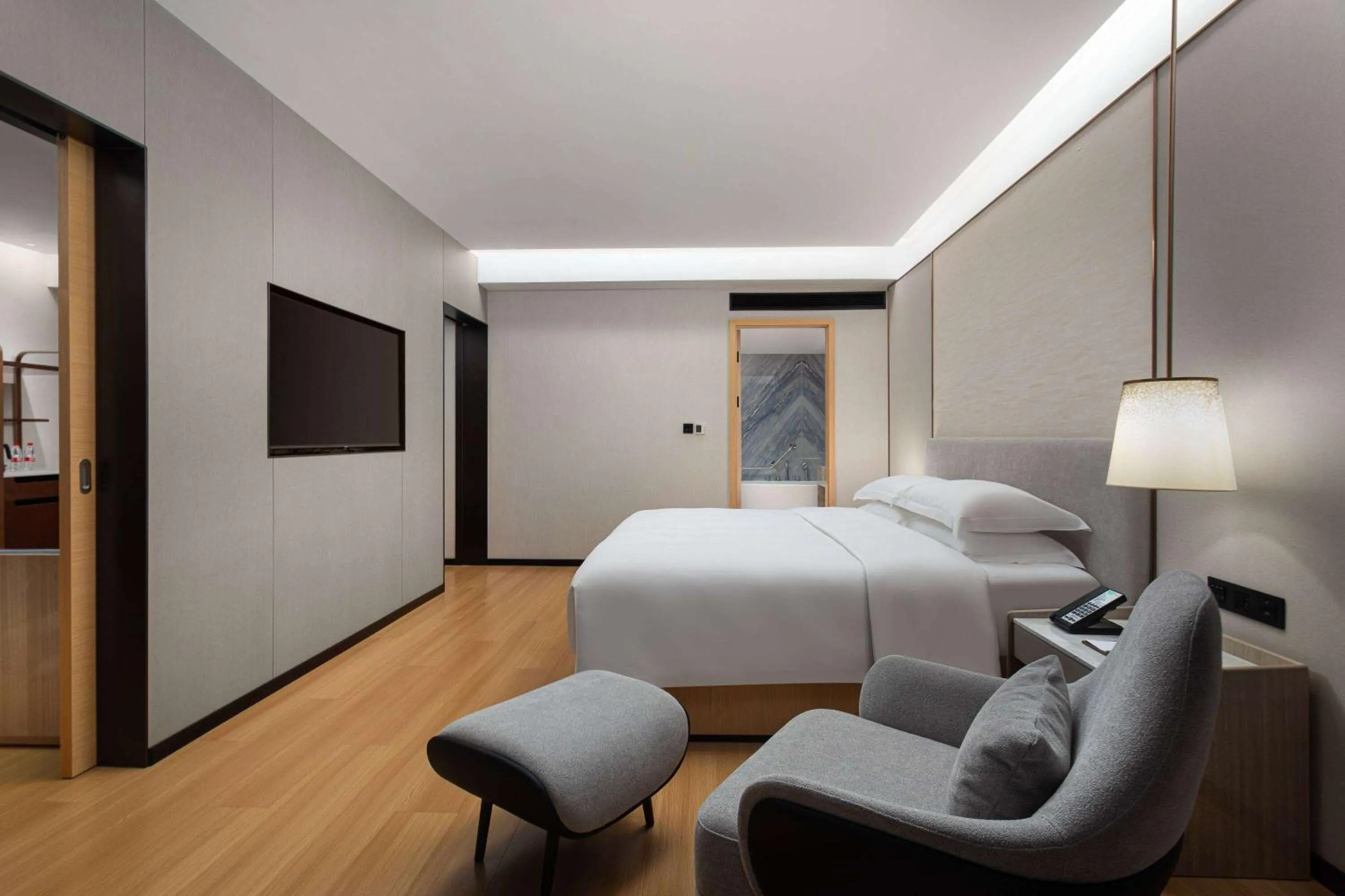 Photo of the whole room, Bed in Wyndham Garden Haikou Meilan
