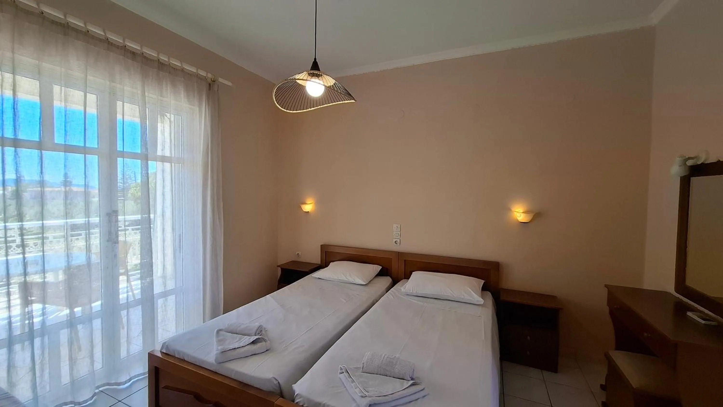 Bed in Sunflower Apartments & Studios