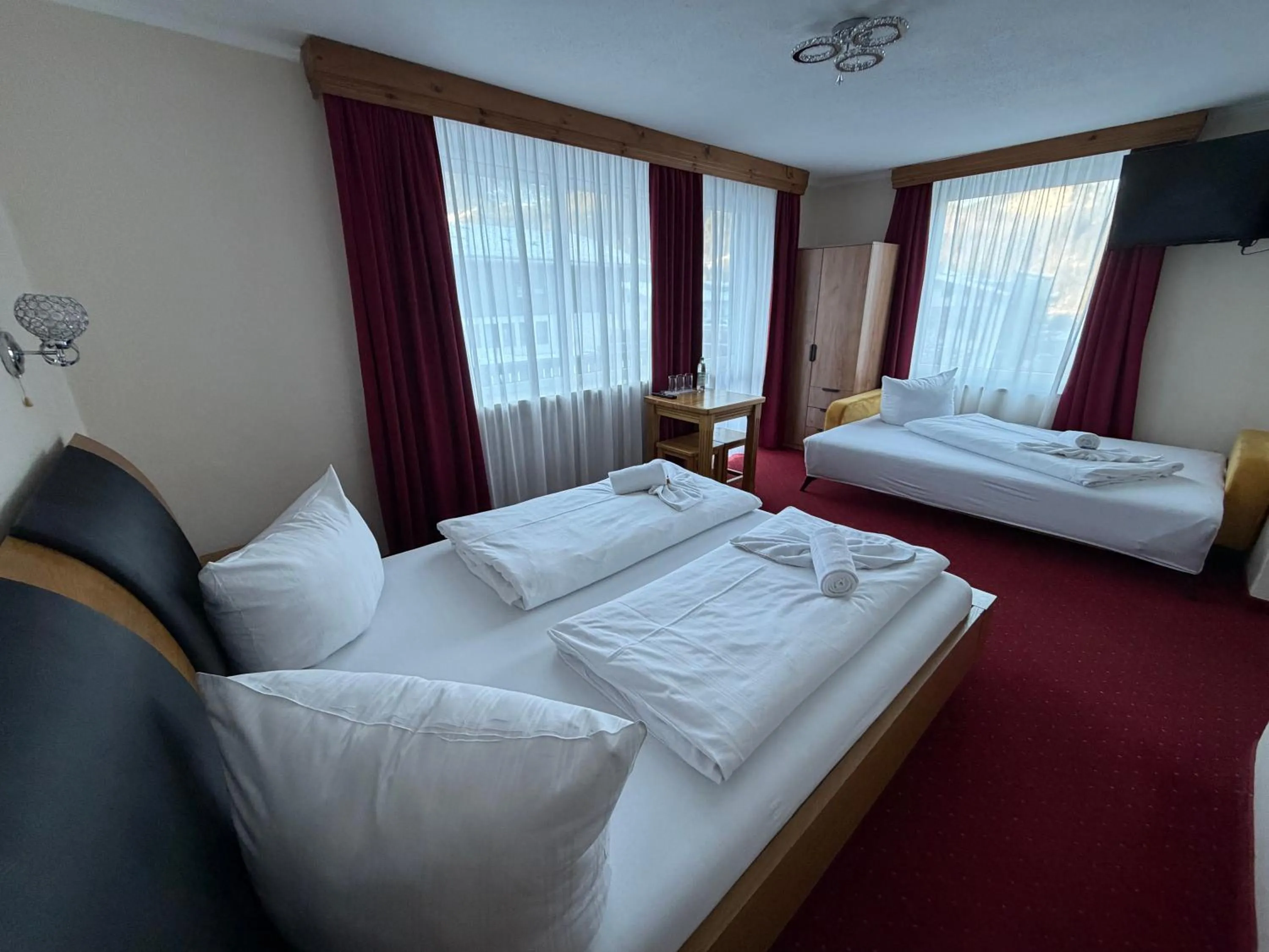 Photo of the whole room, Bed in Hotel Gundl Alm