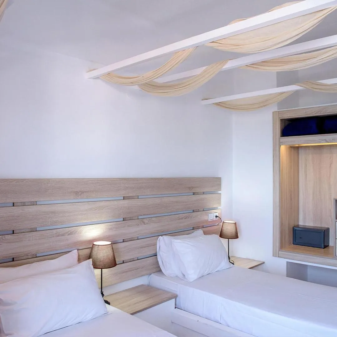 Bed in Elmi Beach Hotel & Suites