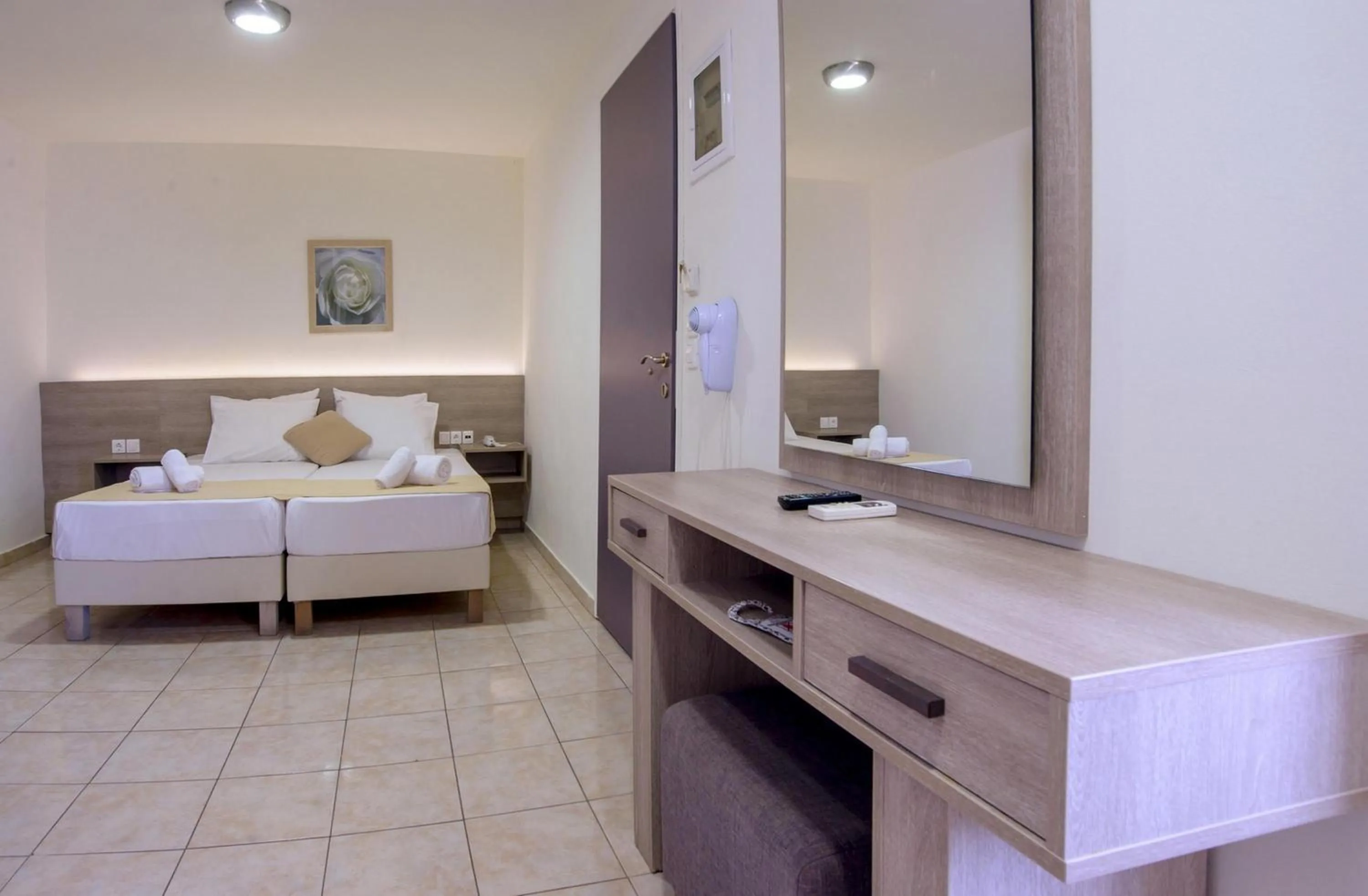 Bed in Elmi Beach Hotel & Suites