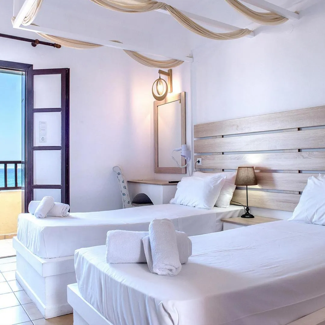 Bed in Elmi Beach Hotel & Suites