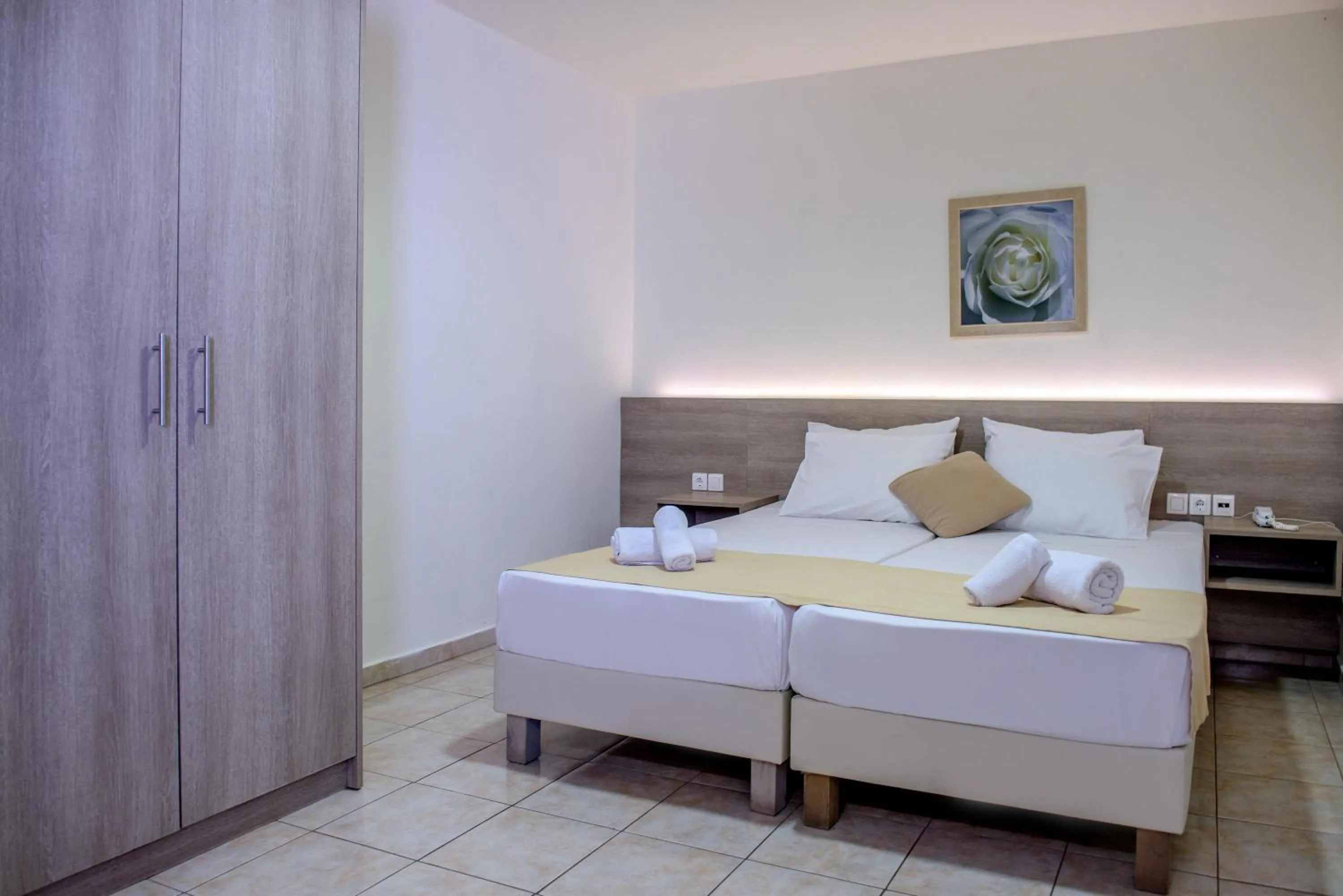 Bed in Elmi Beach Hotel & Suites