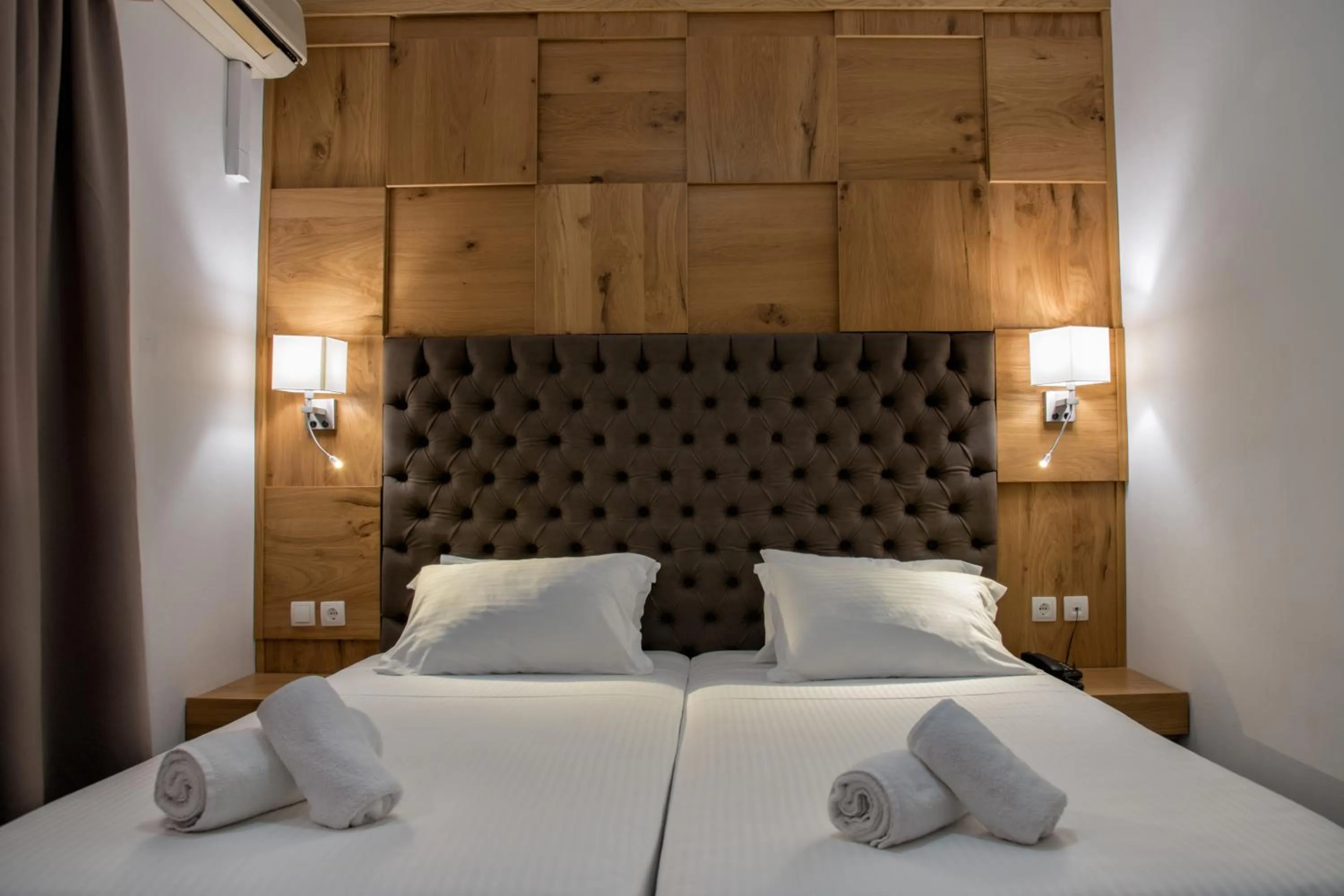 Bed in Elmi Beach Hotel & Suites