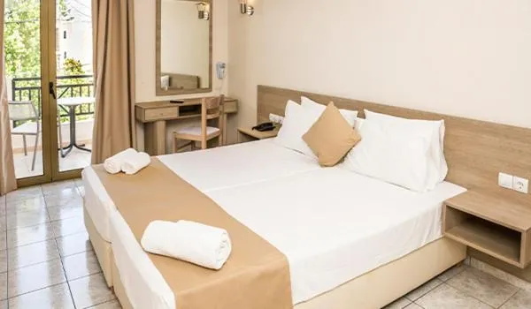 Bed in Elmi Beach Hotel & Suites