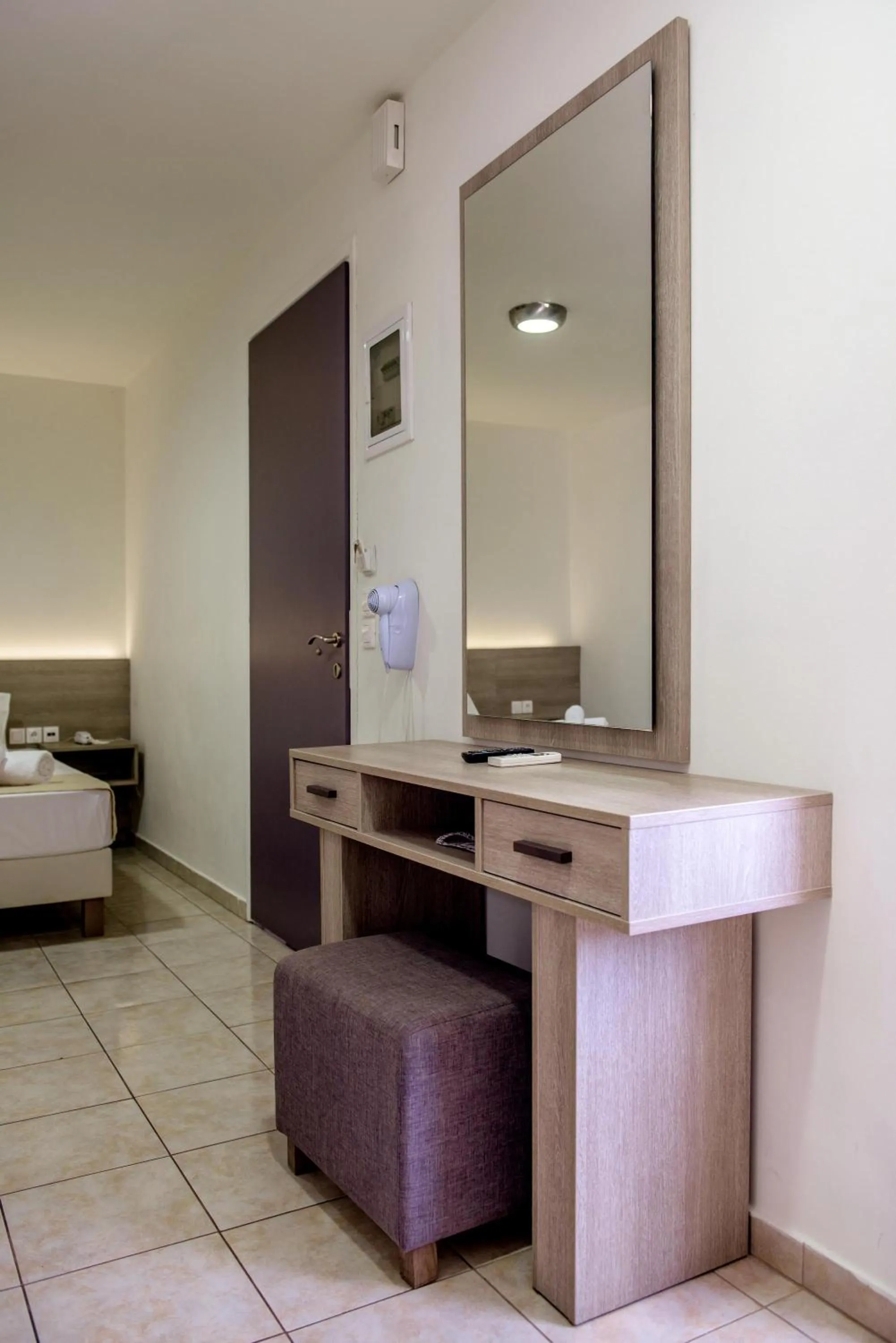 Bed in Elmi Beach Hotel & Suites