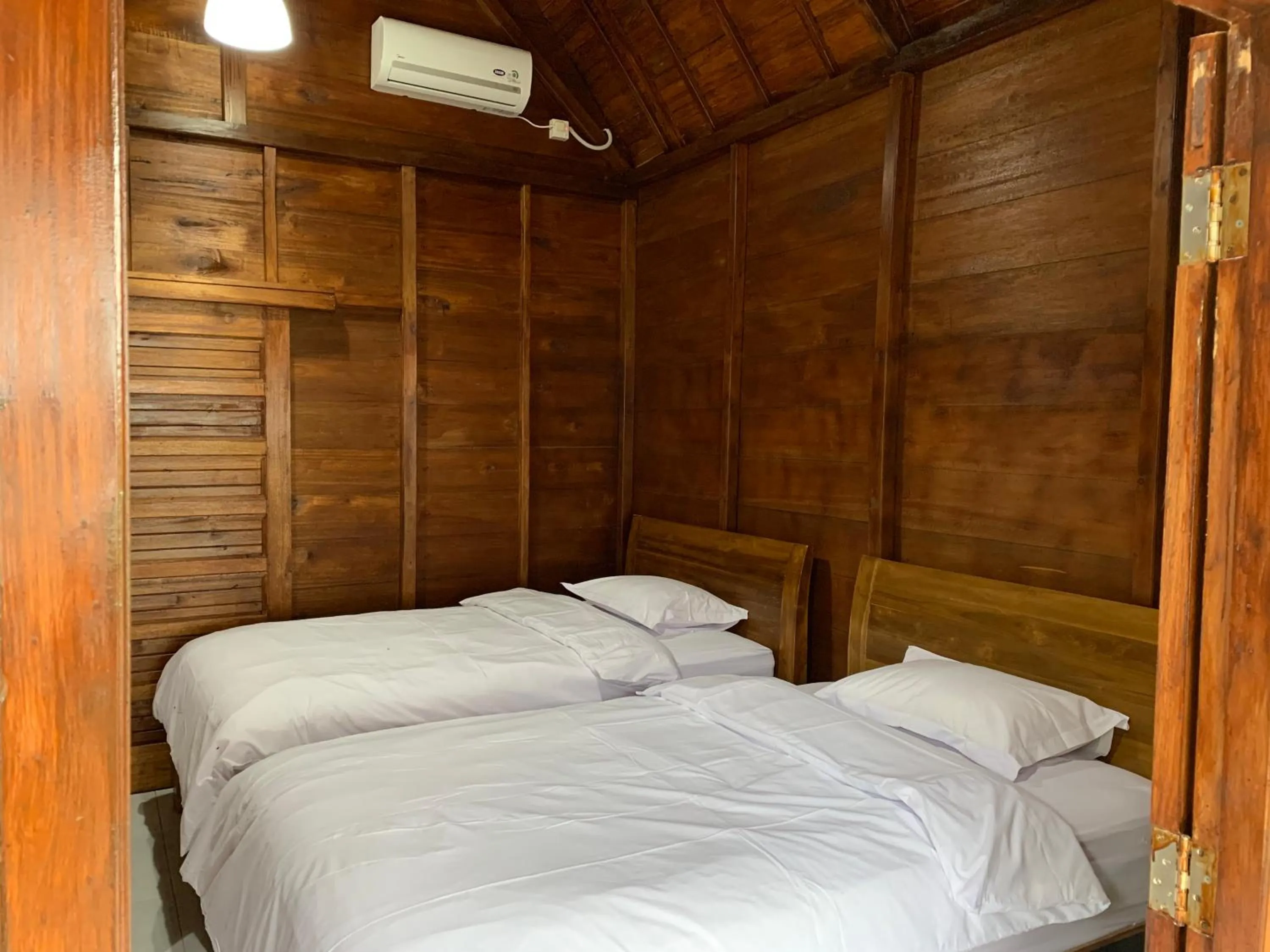 Photo of the whole room, Bed in Tanah Penida Bungalows