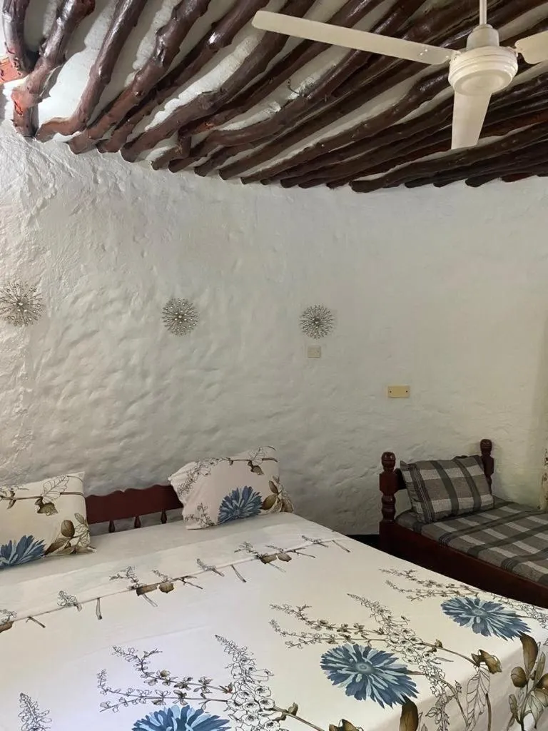 Bed in Tradewinds Lodge