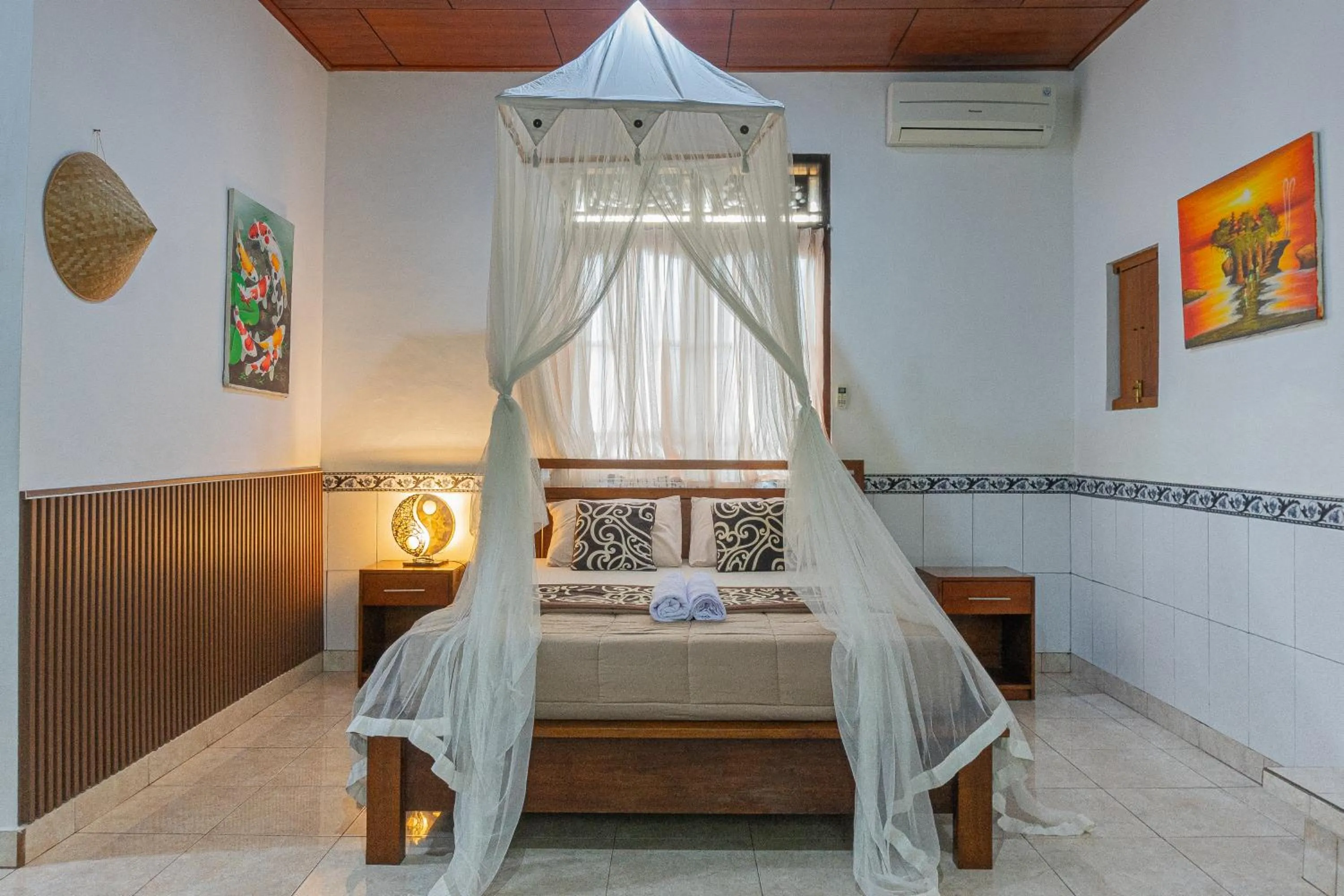 Bed in Artha Dewata Home Stay