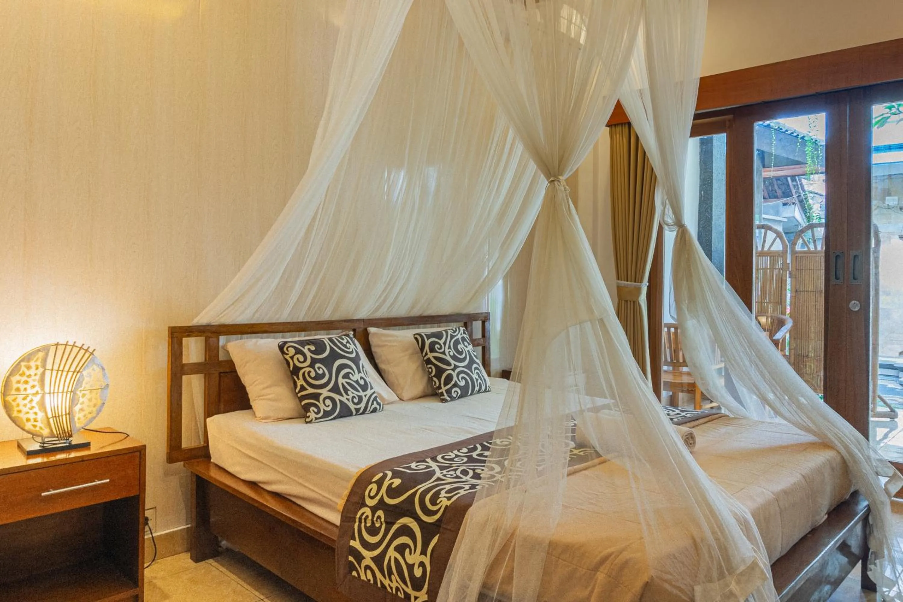 Bed in Artha Dewata Home Stay