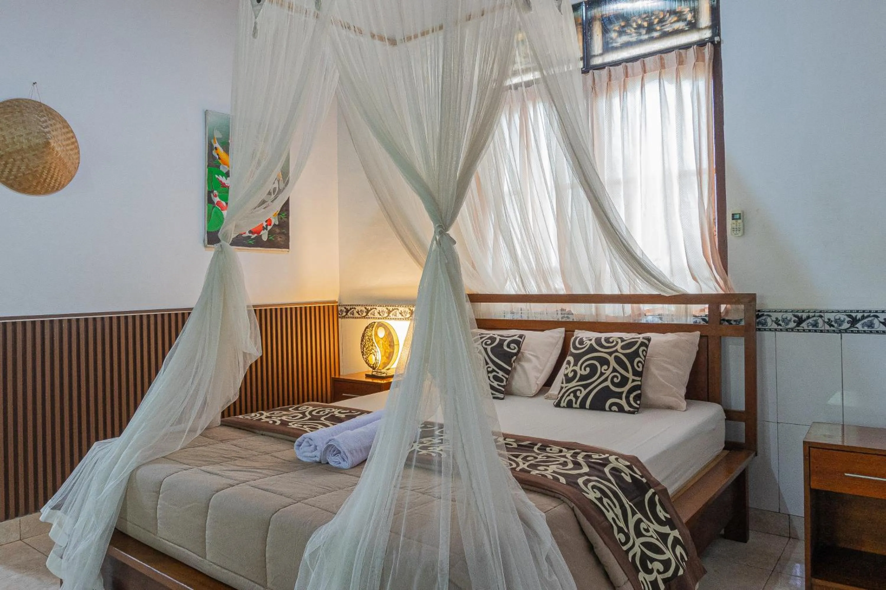 Bed in Artha Dewata Home Stay