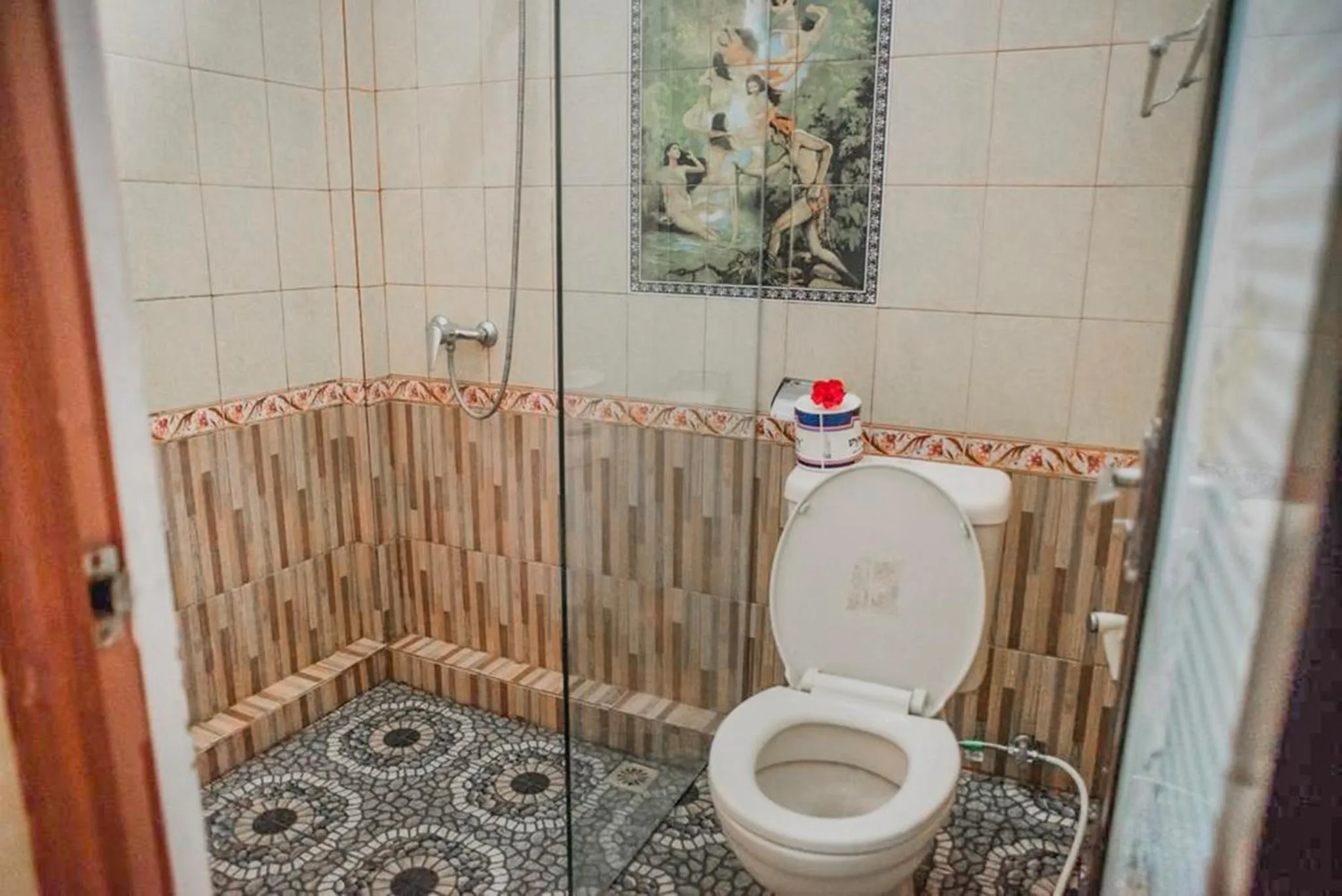 Toilet in Artha Dewata Home Stay