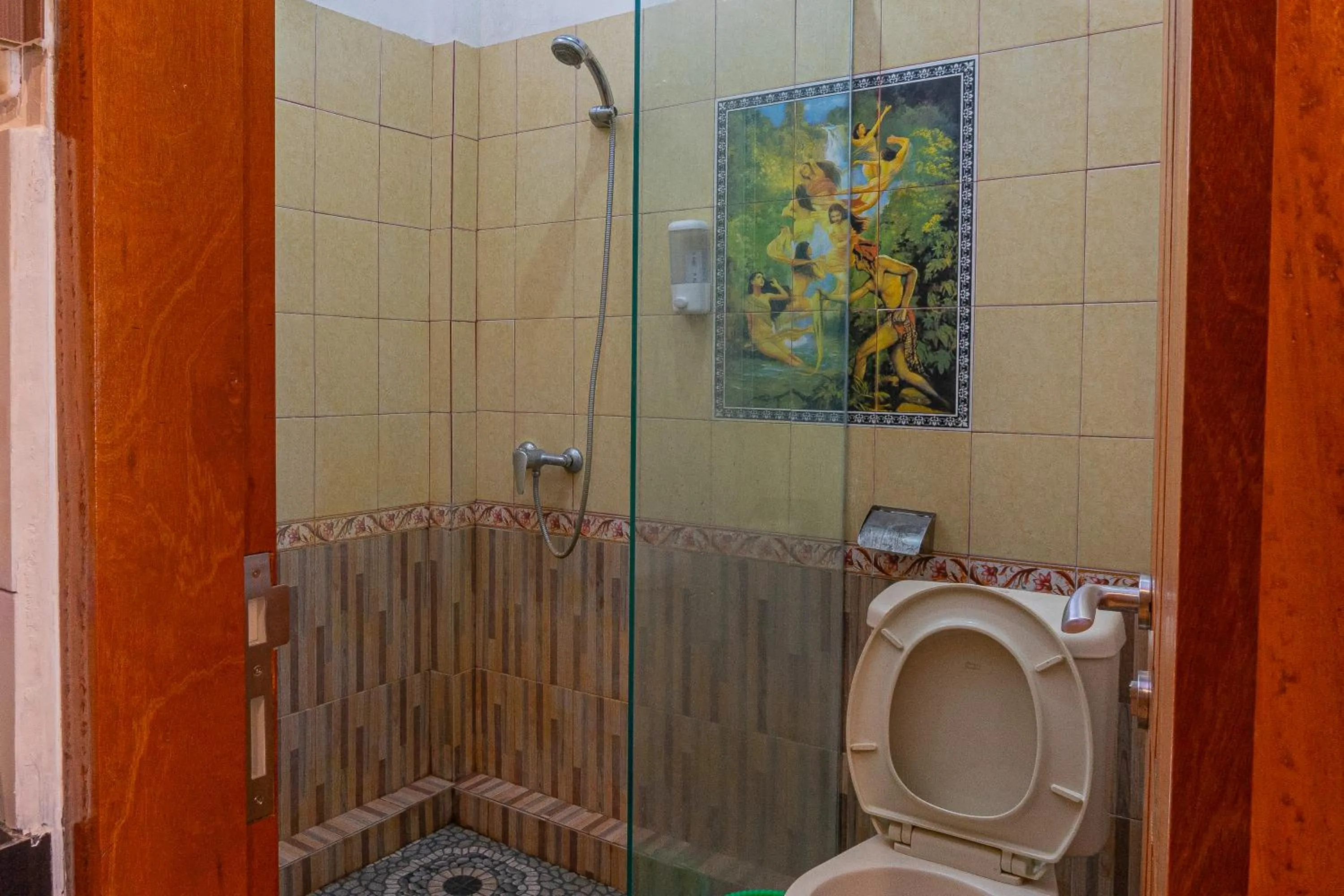 Toilet in Artha Dewata Home Stay