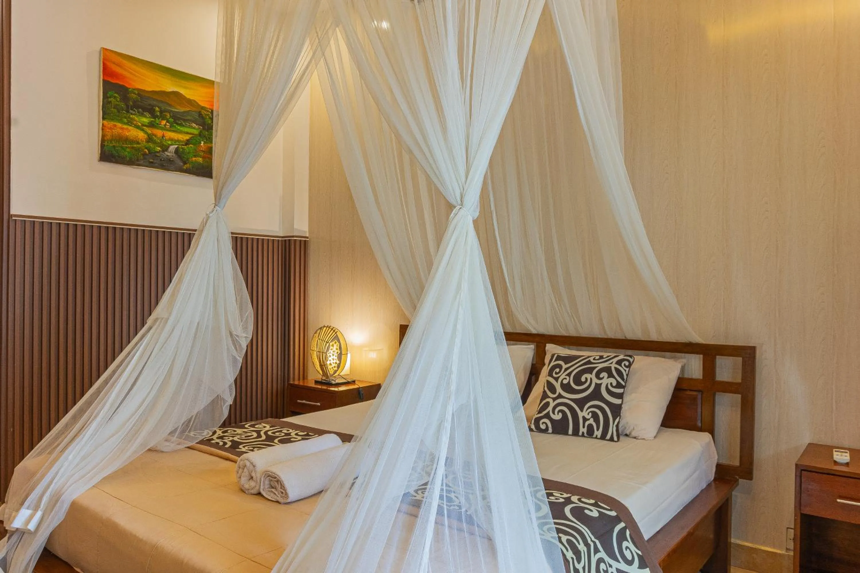 Bed in Artha Dewata Home Stay