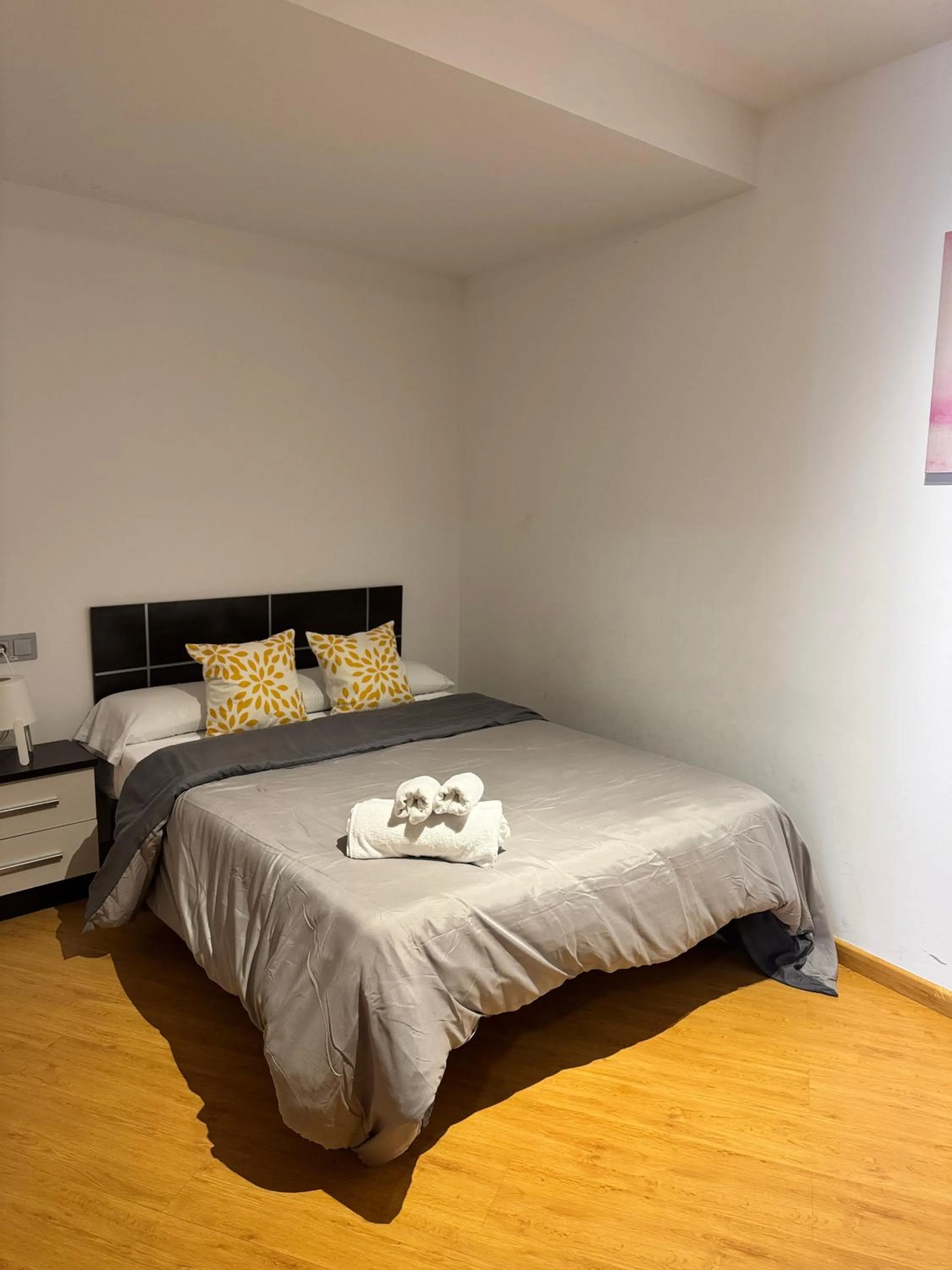 Bed in Wave Apartments