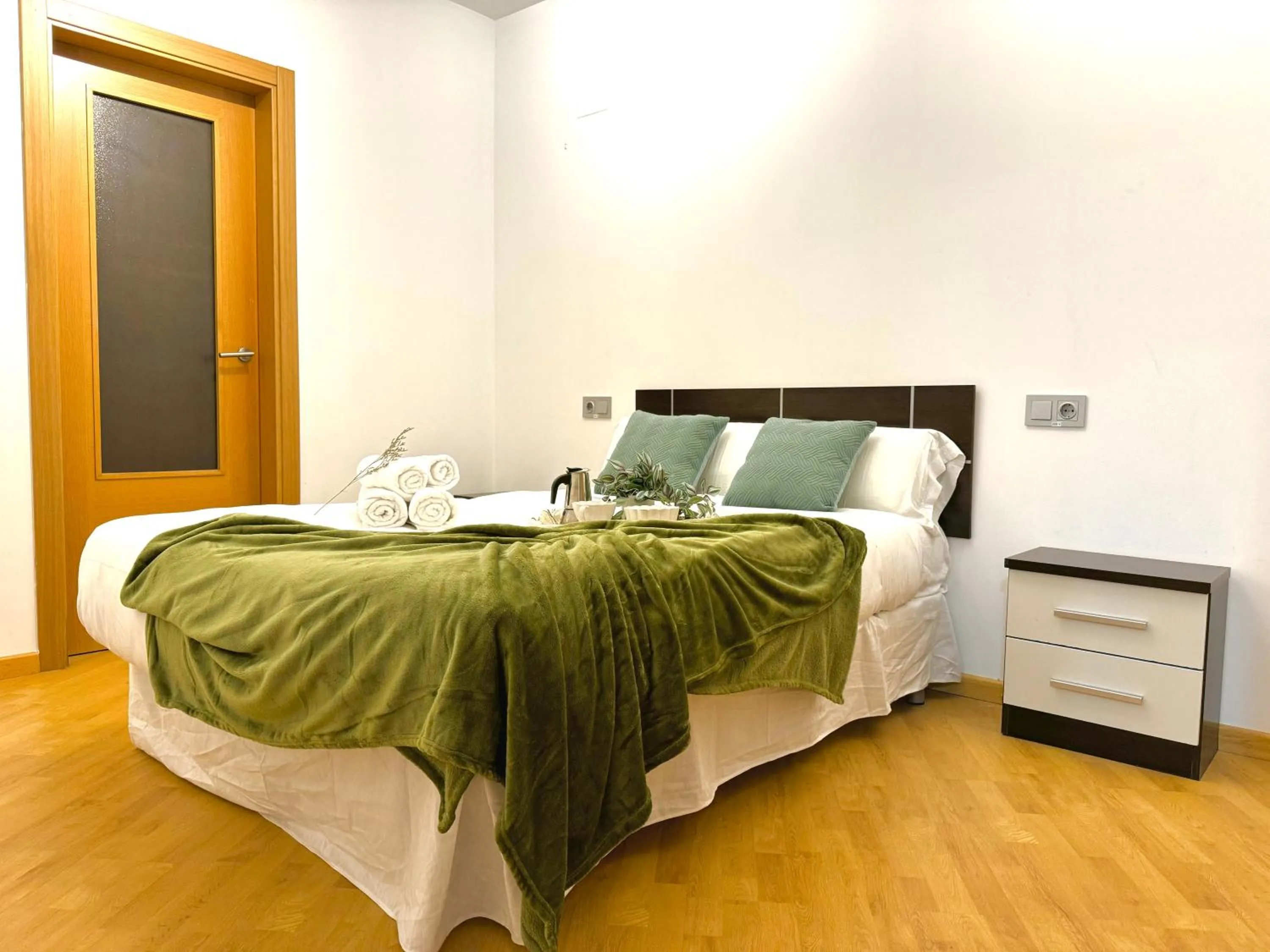 Bed in Wave Apartments