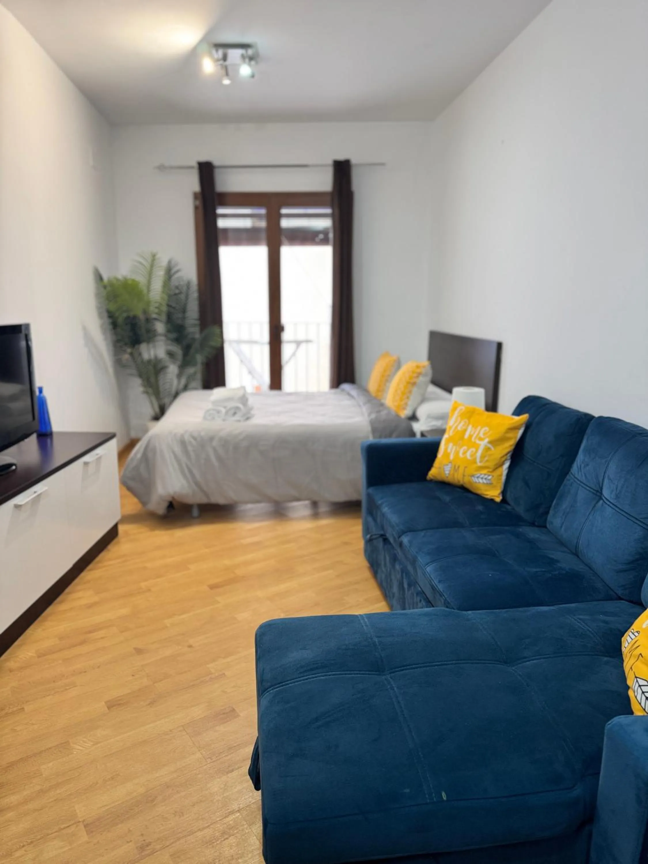 Bed in Wave Apartments