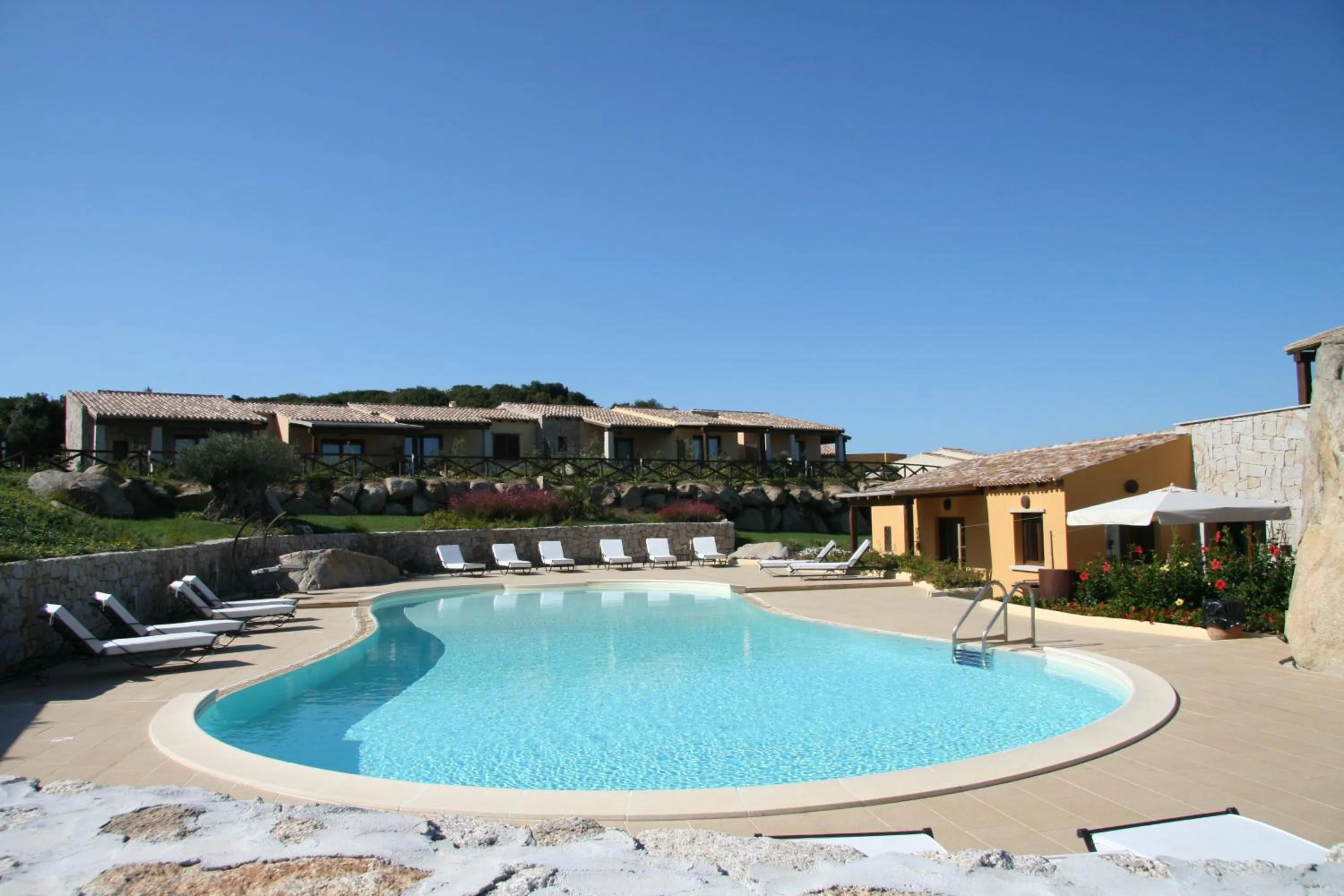Swimming pool in Punta Falcone Resort