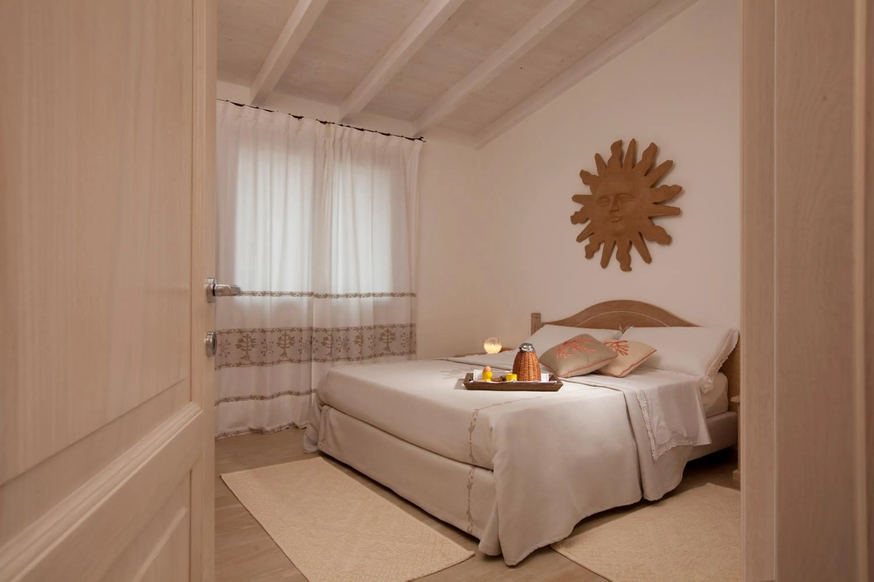 Photo of the whole room, Bed in Punta Falcone Resort