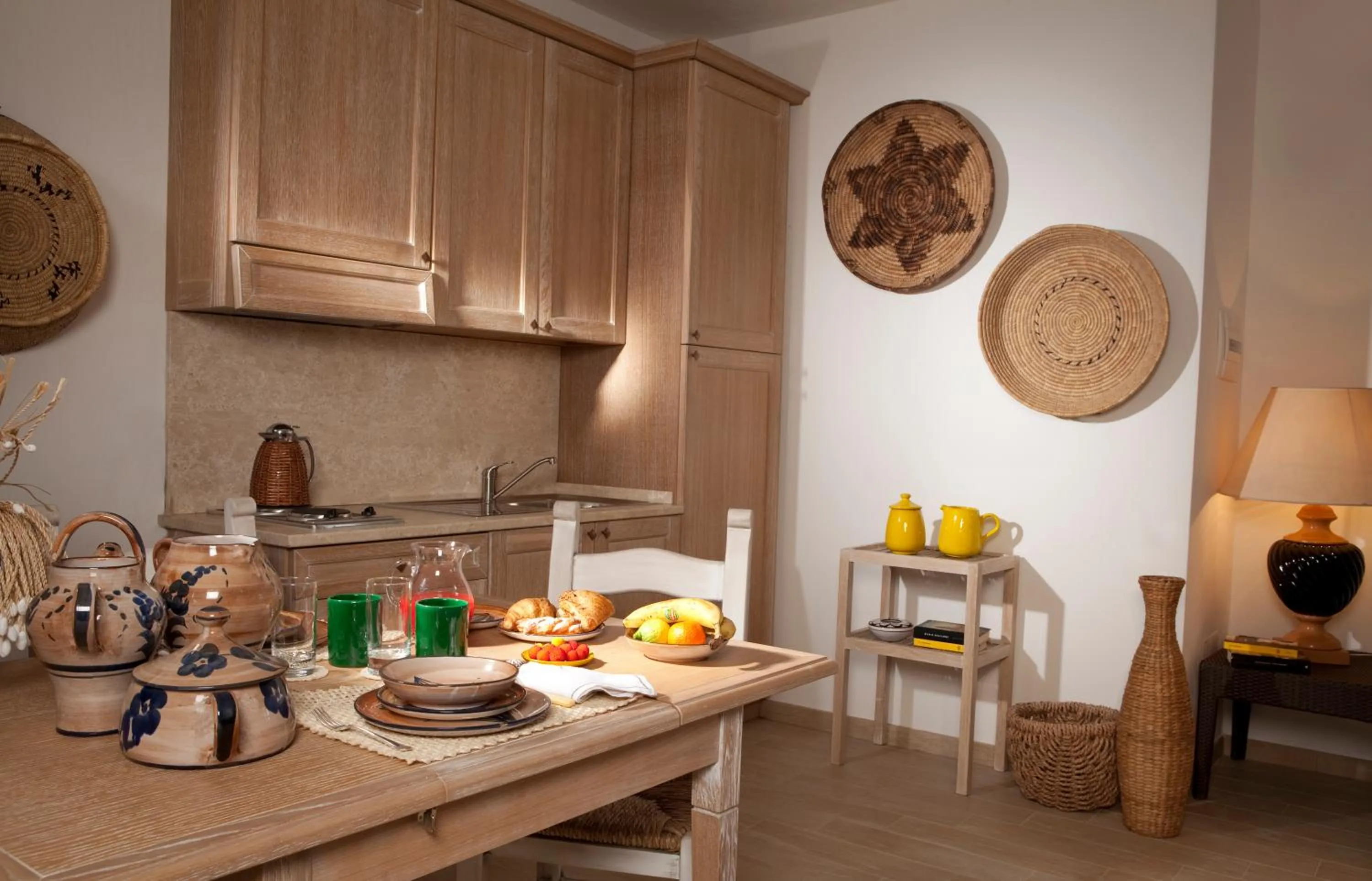 Kitchen or kitchenette in Punta Falcone Resort