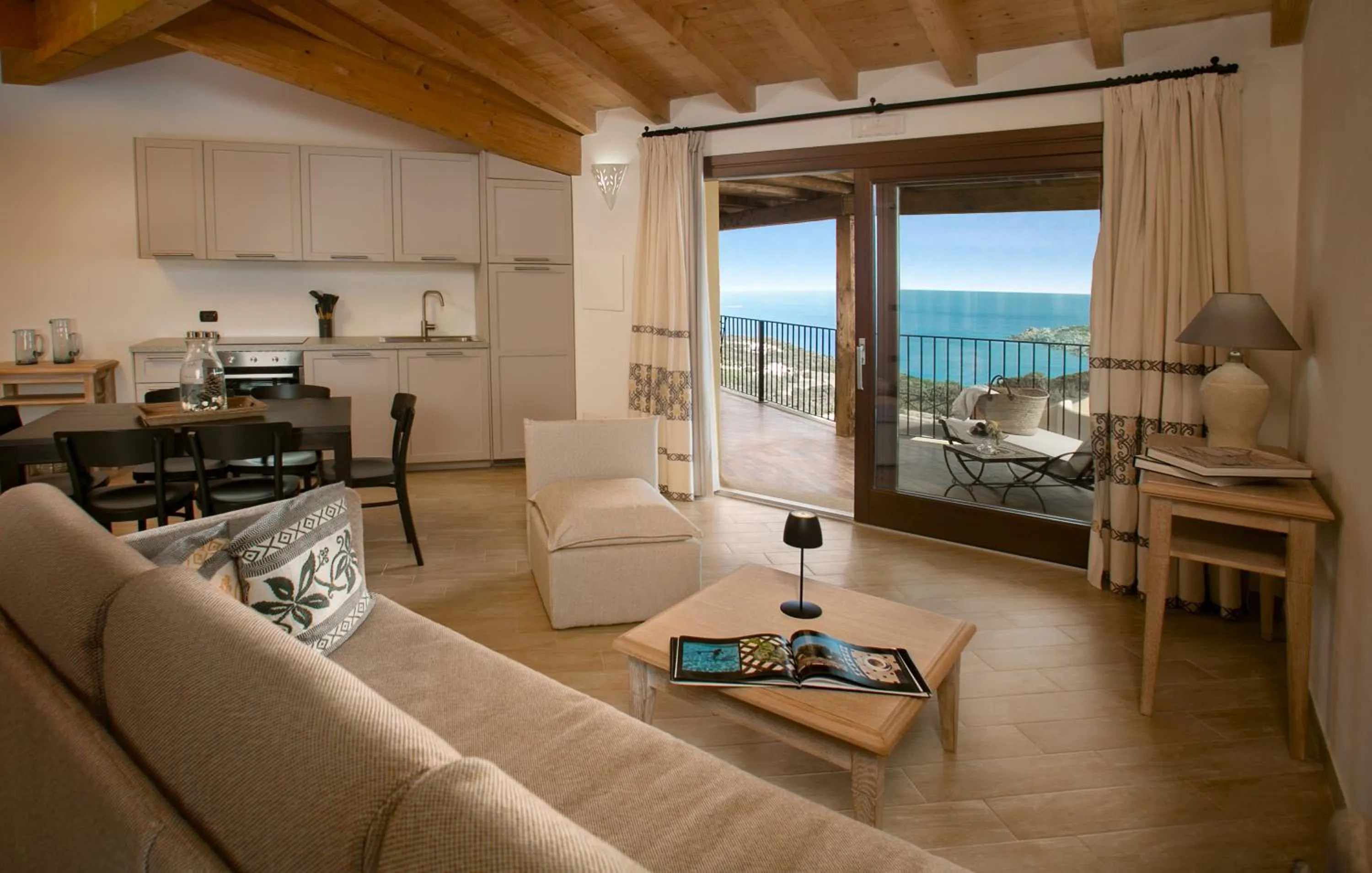 Kitchen or kitchenette in Punta Falcone Resort