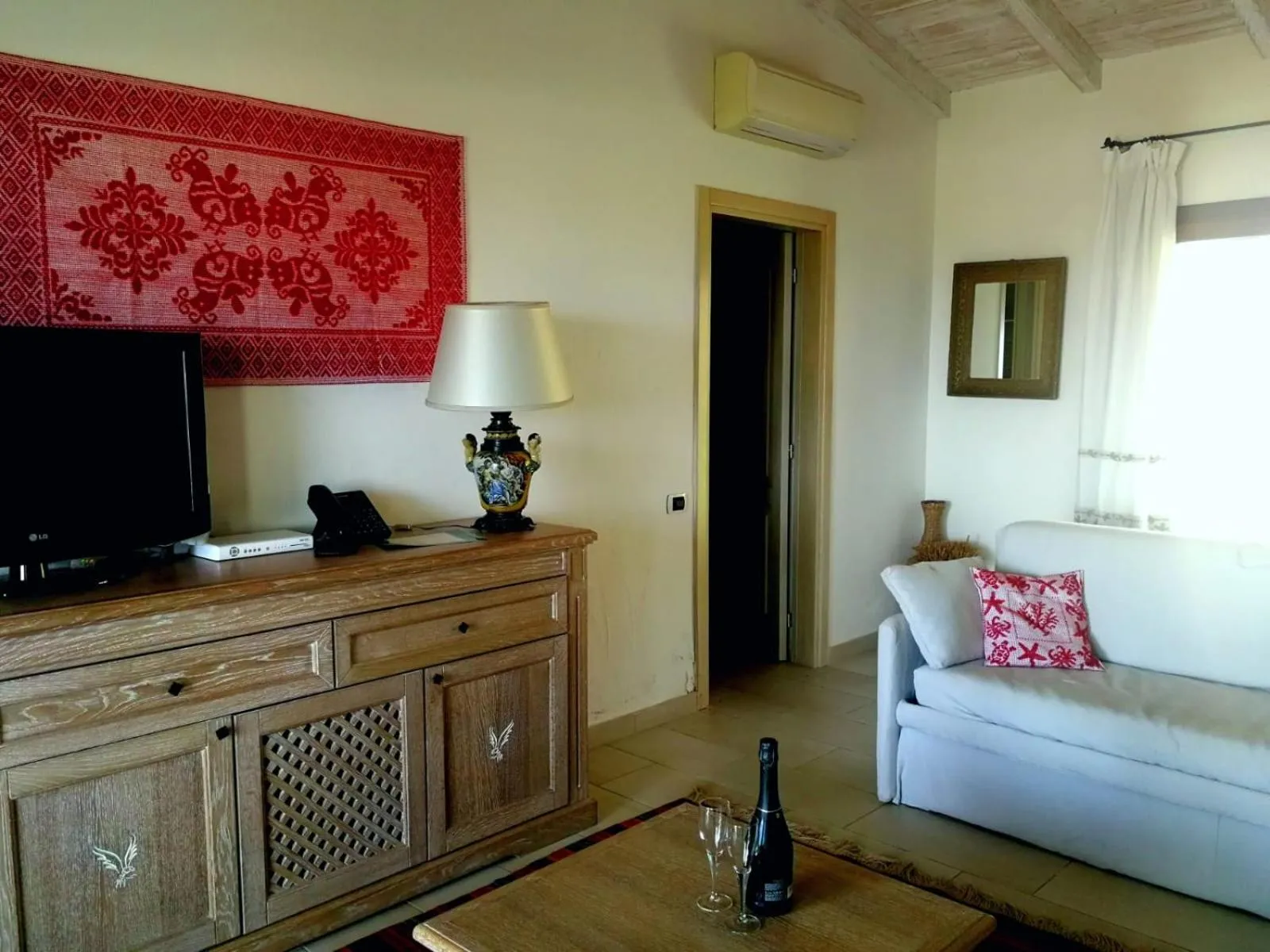 Living room in Punta Falcone Resort