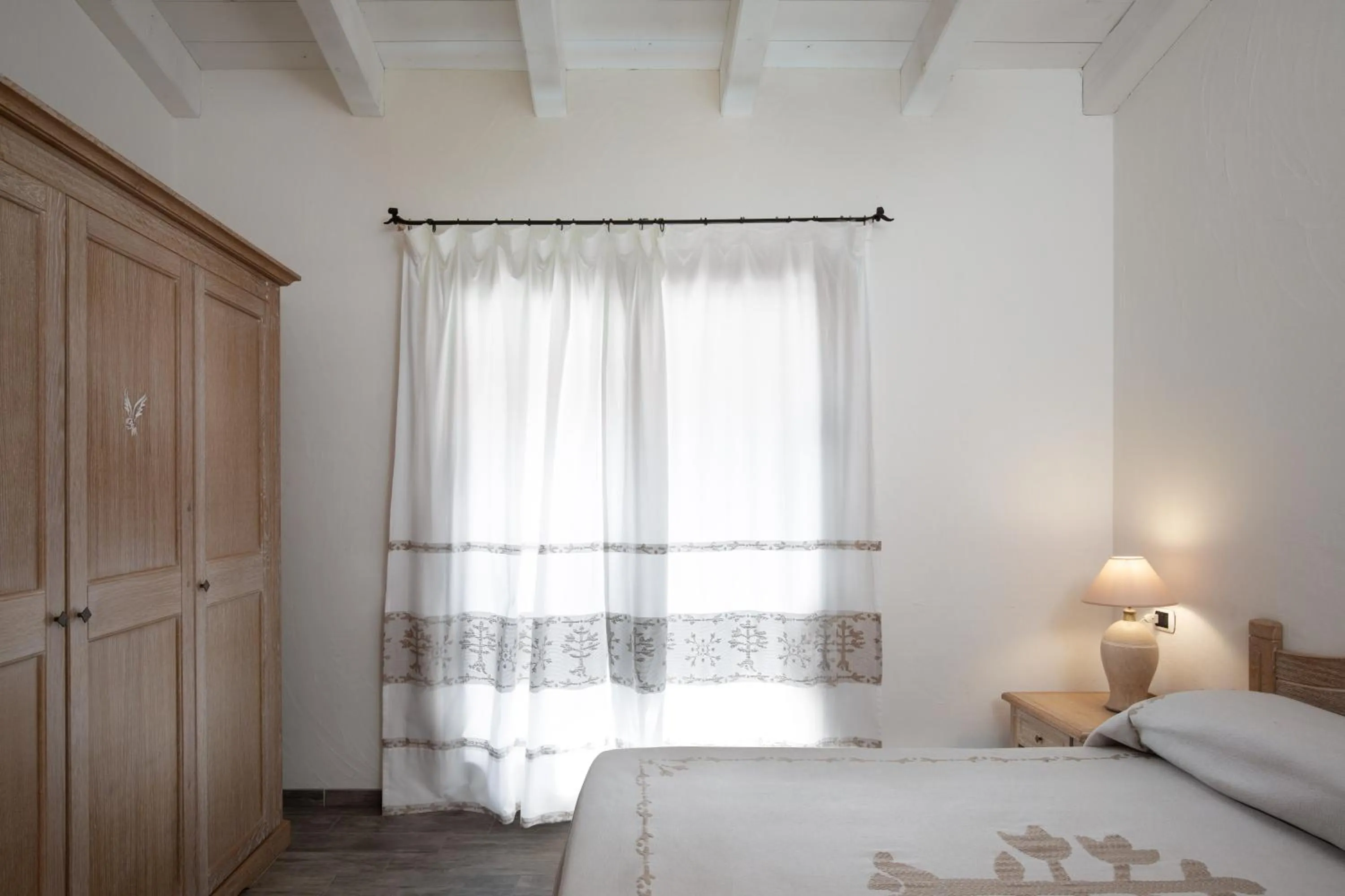 Photo of the whole room, Bed in Punta Falcone Resort