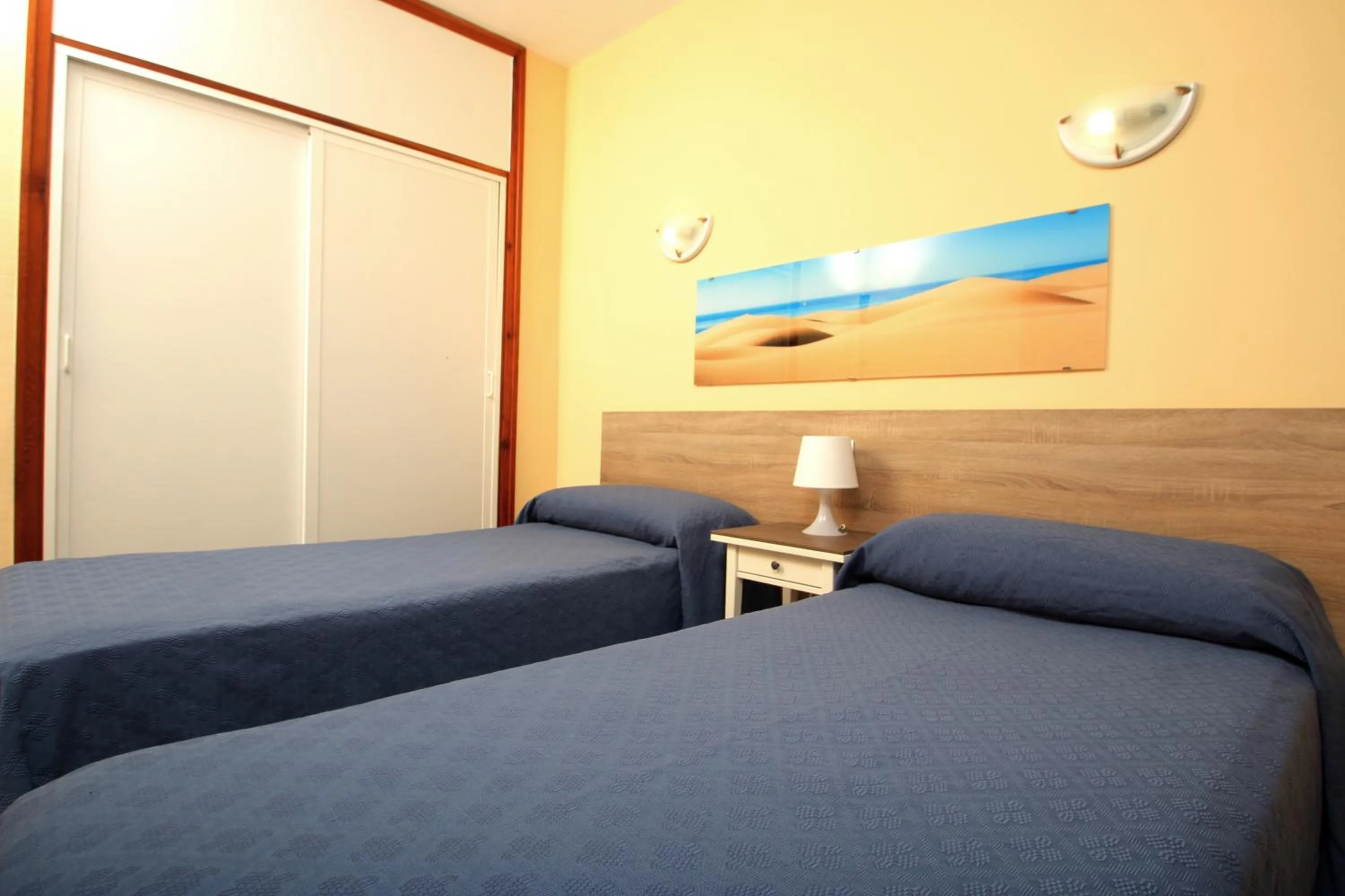 Bed in Apartamentos Strelitzias