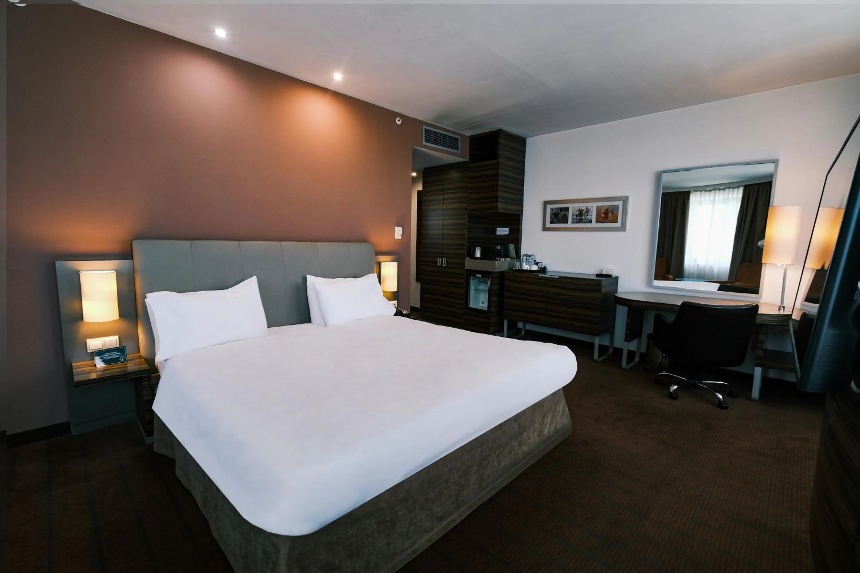 Photo of the whole room, Bed in Holiday Inn Almaty by IHG