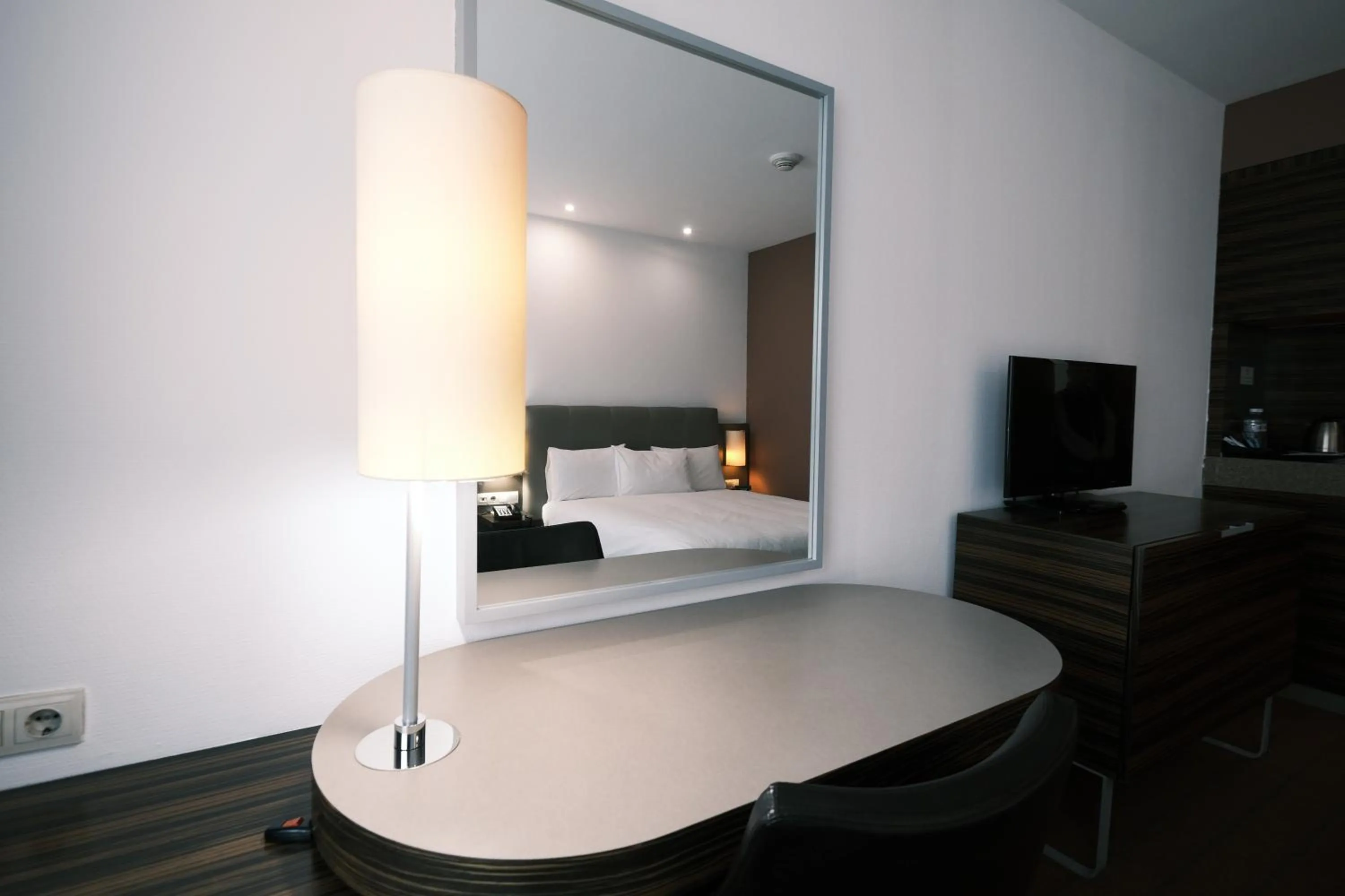 Photo of the whole room, Bed in Holiday Inn Almaty by IHG