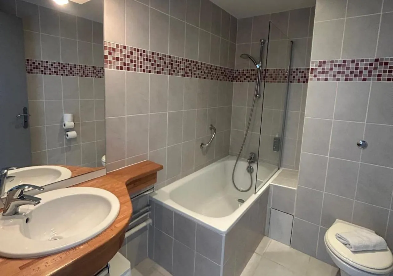 Bathroom in Brit Hotel La Ferté sous Jouarre