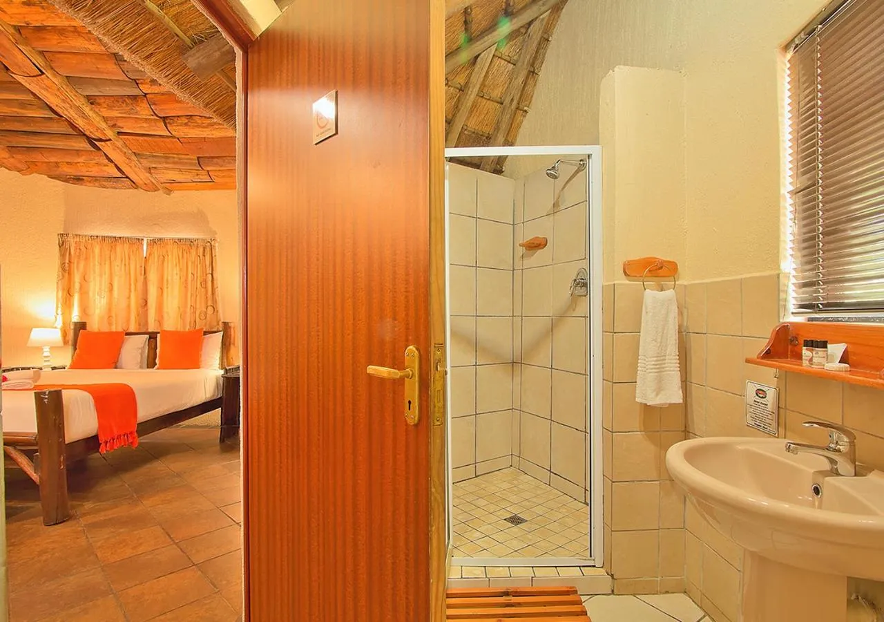 Bed in Kruger Adventure Lodge