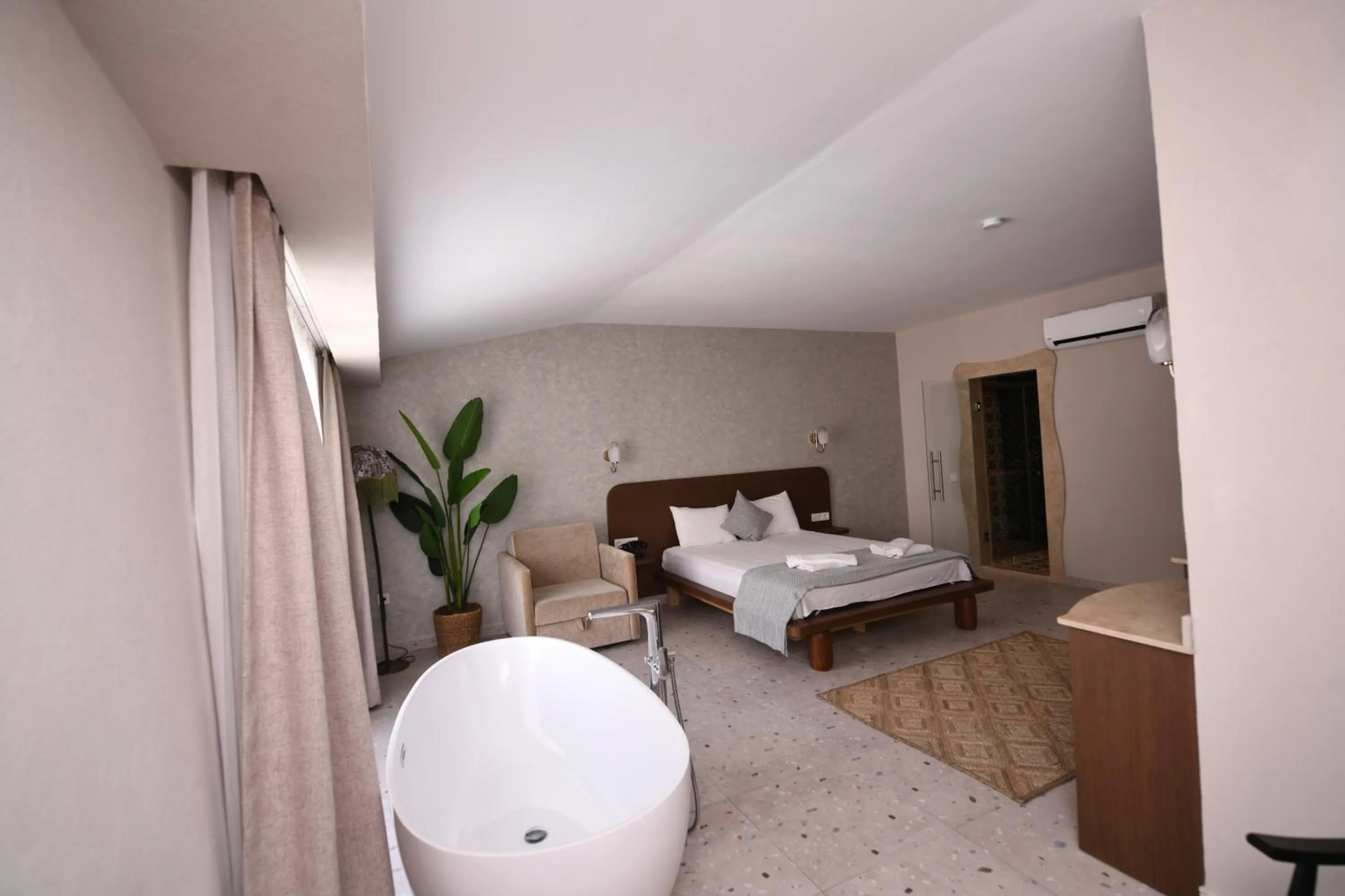 Bed in Montebello Deluxe Hotel