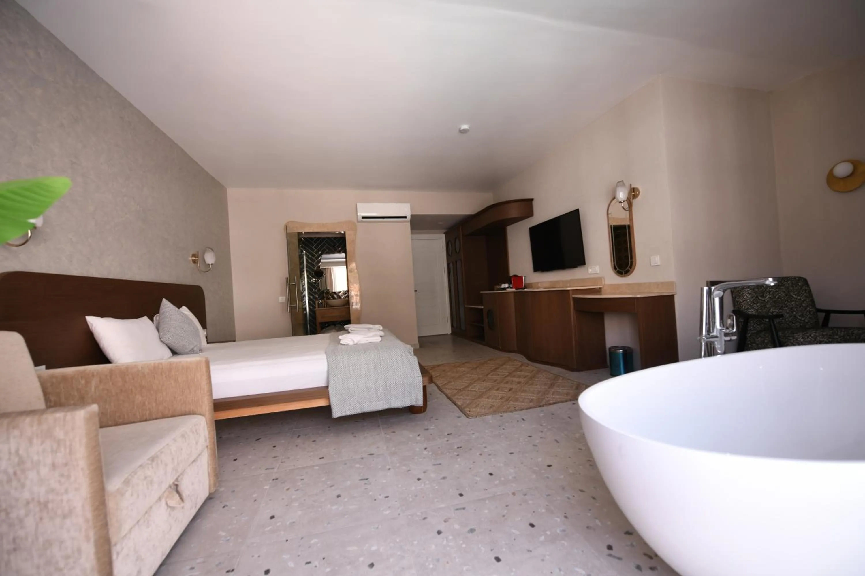 Bed in Montebello Deluxe Hotel