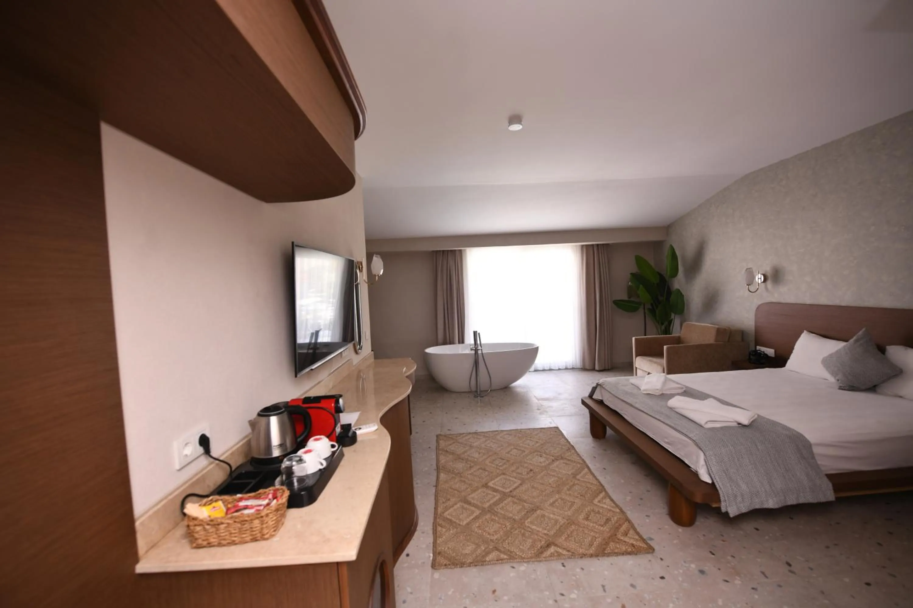 Bed in Montebello Deluxe Hotel