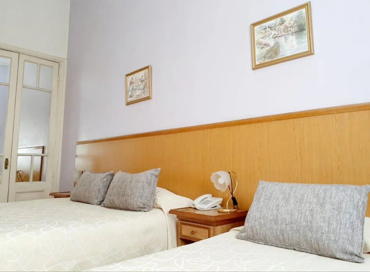 Bed in Hotel Benevento