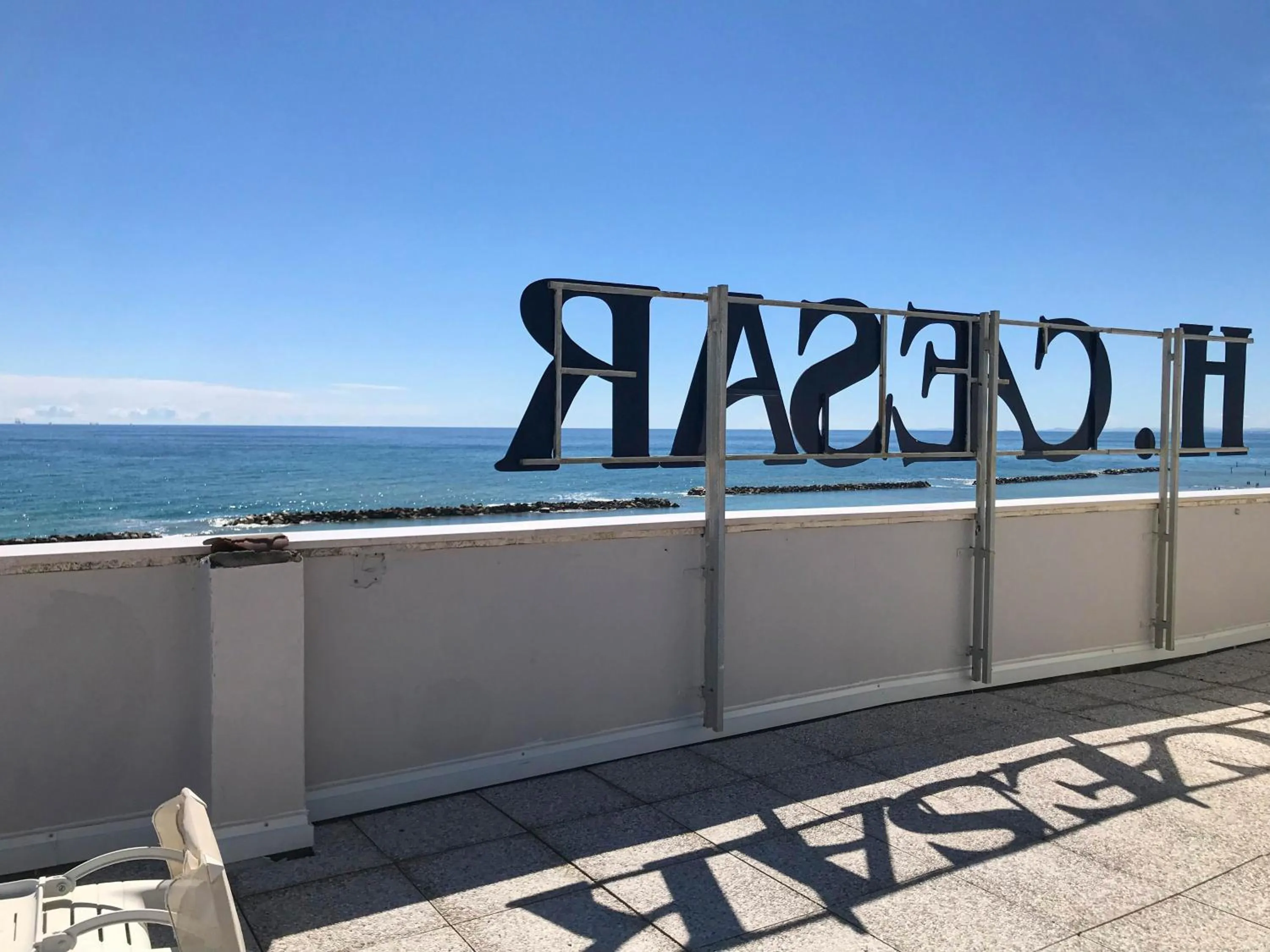 Property logo or sign in Hotel Caesar