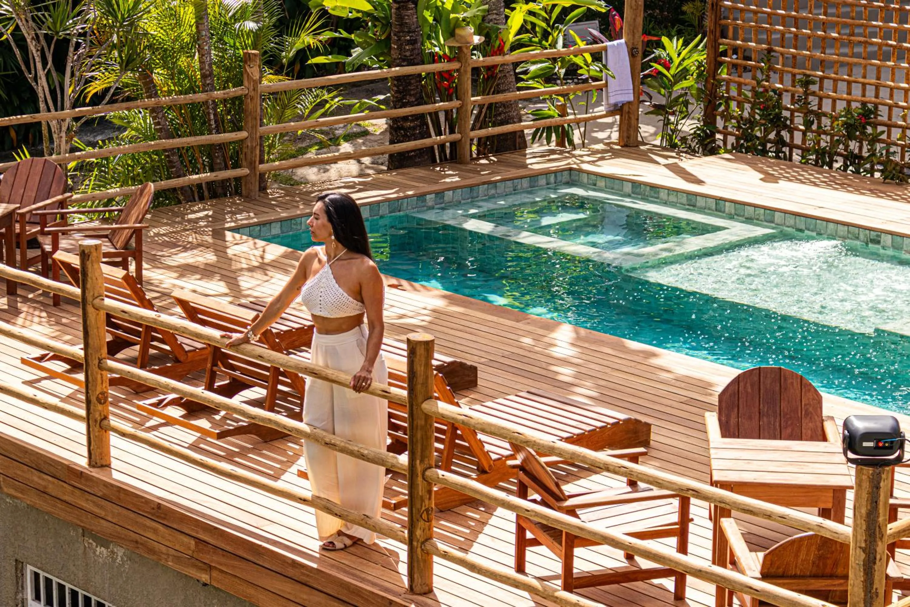 Swimming pool in Pousada Encantos de Arraial