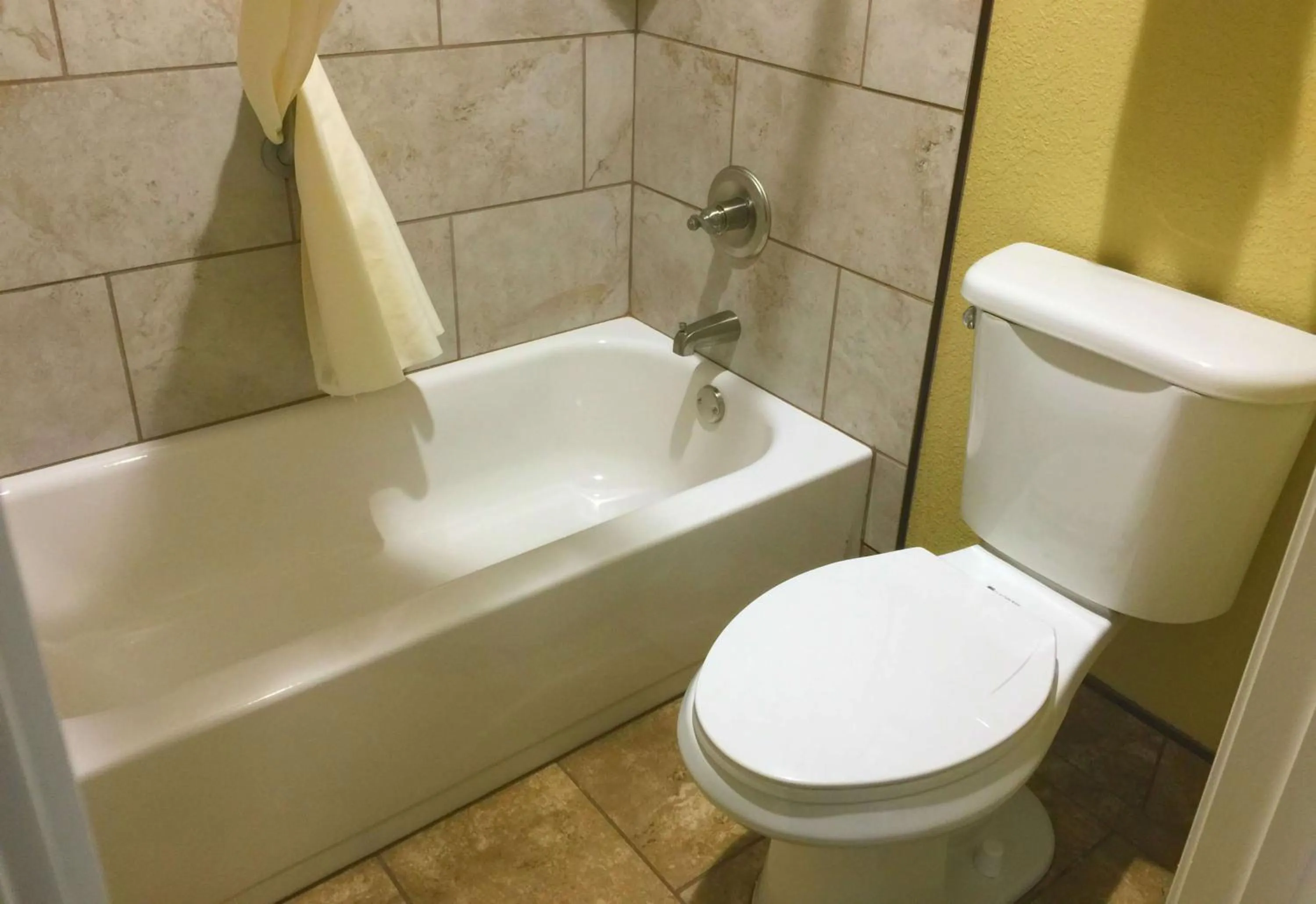 Bathroom in Howard Johnson by Wyndham Pigeon Forge