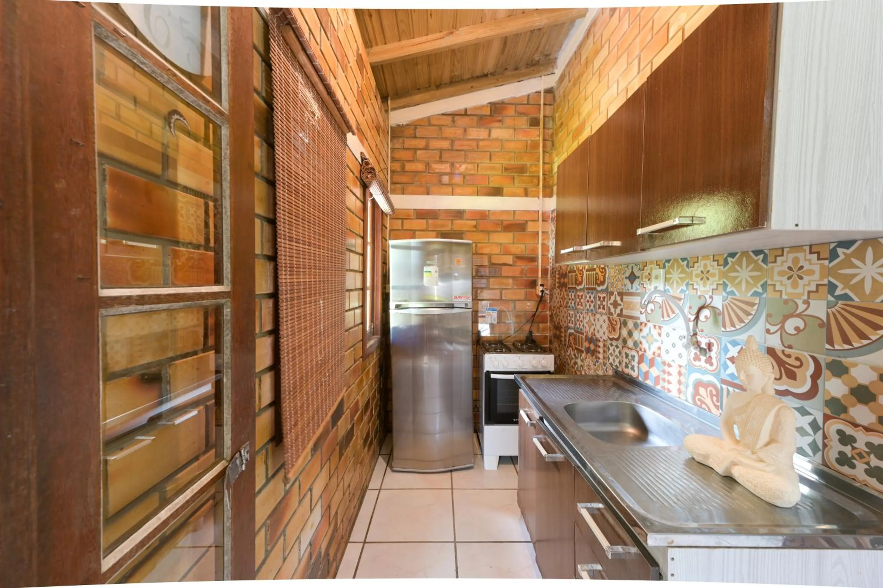 kitchen in Hotel Praia Do Rosa